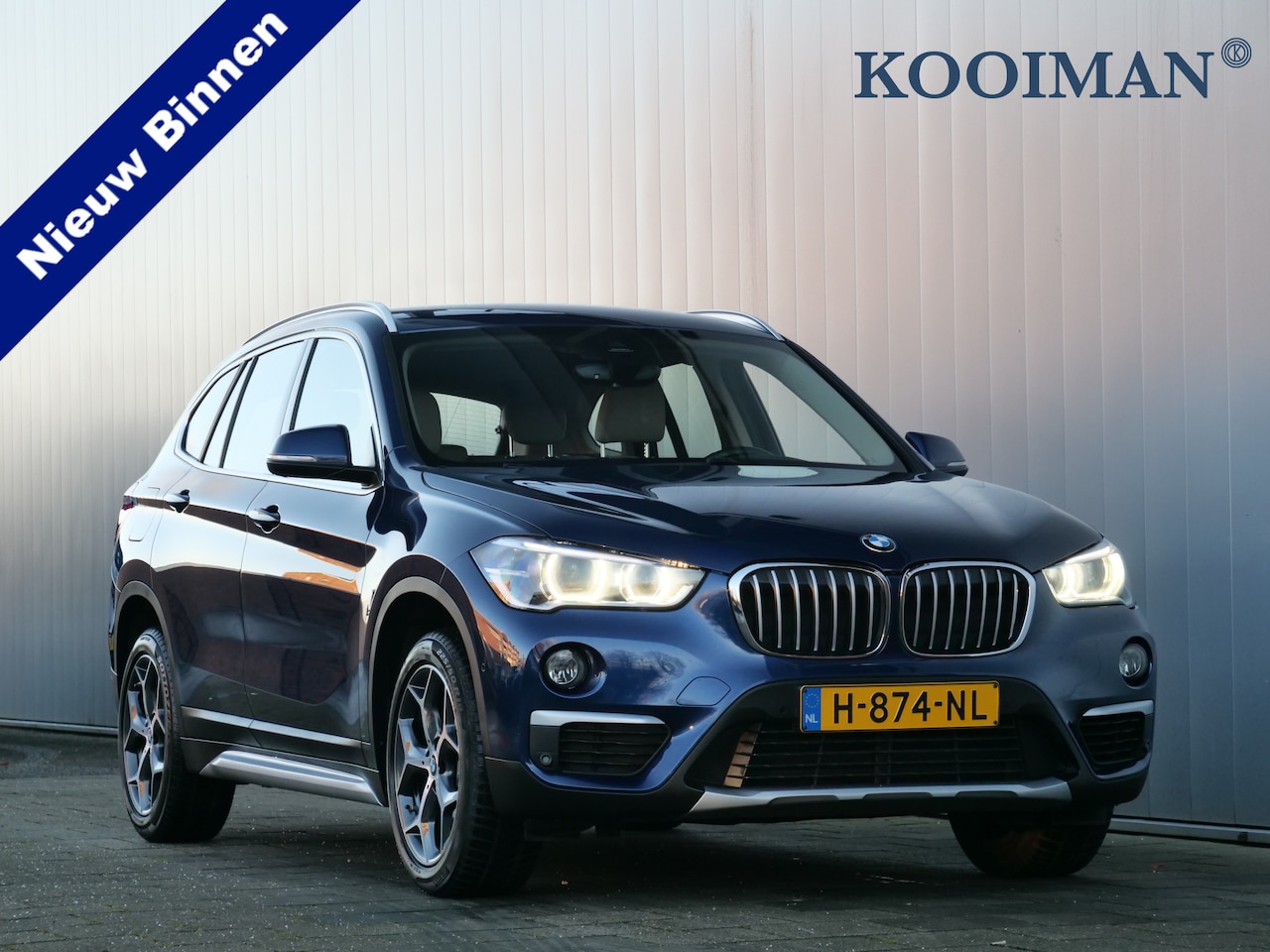 BMW X1 - sDrive18i High Executive 141 Pk Automaat Navigatie / Leer / Camera / Keyless - AutoWereld.nl