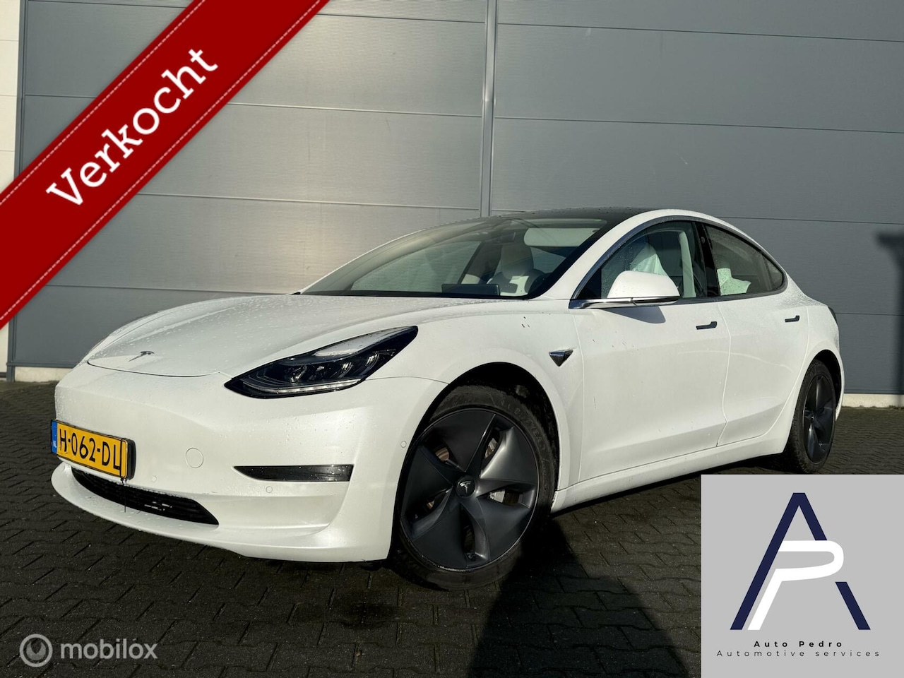 Tesla Model 3 - Long Range RWD Long Range AWD 75 kWh Pearl Trekhaak Wit leer - AutoWereld.nl