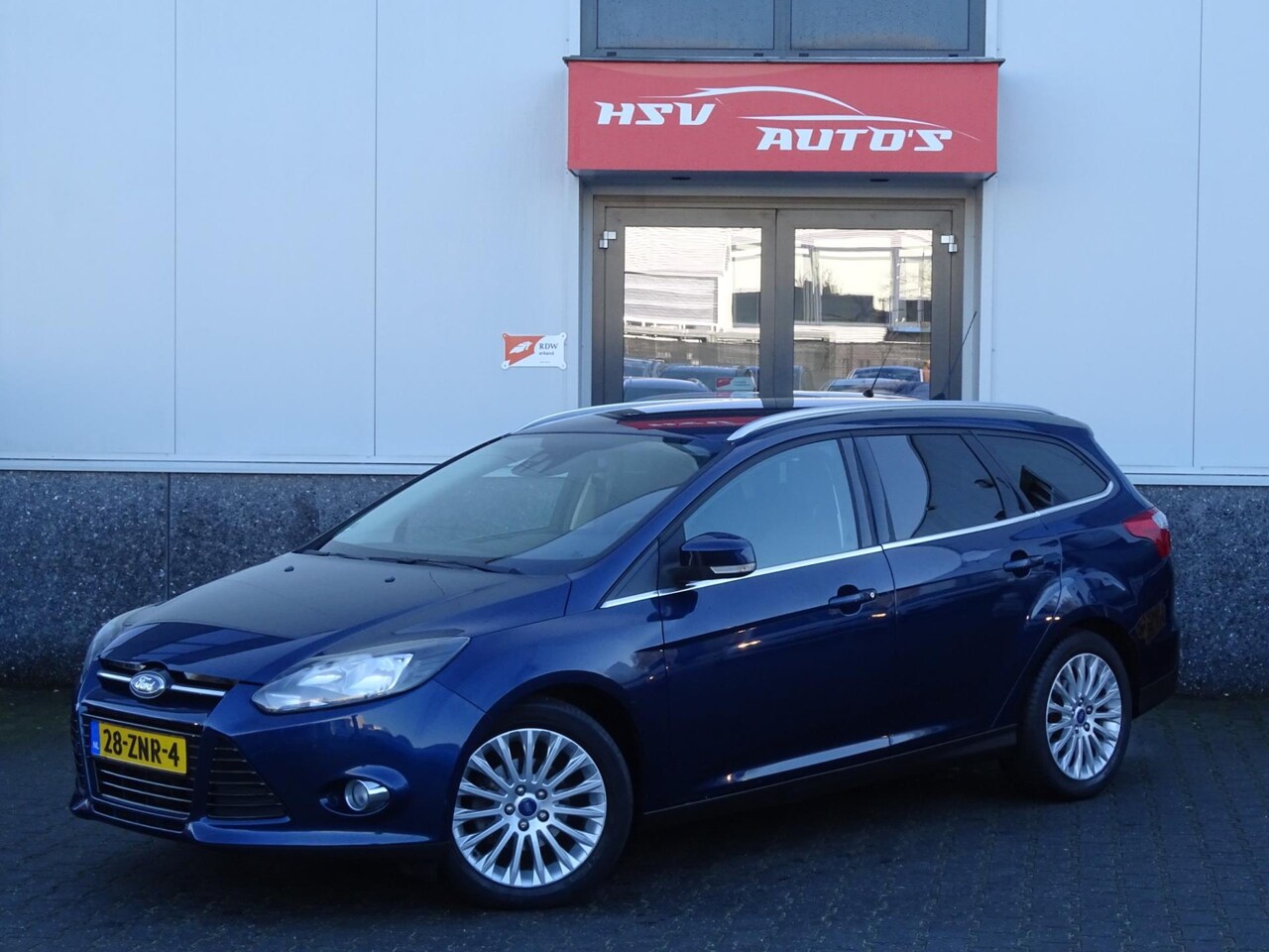 Ford Focus Wagon - 1.0 EcoBoost Titanium navi LM airco - AutoWereld.nl