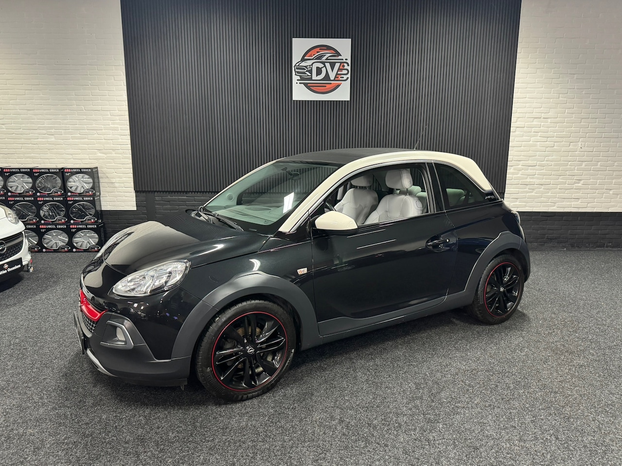 Opel ADAM - 1.0 Turbo Rocks 1.0 Turbo Rocks, WIT LEER, OPEN DAK,CRUISE,PDC - AutoWereld.nl