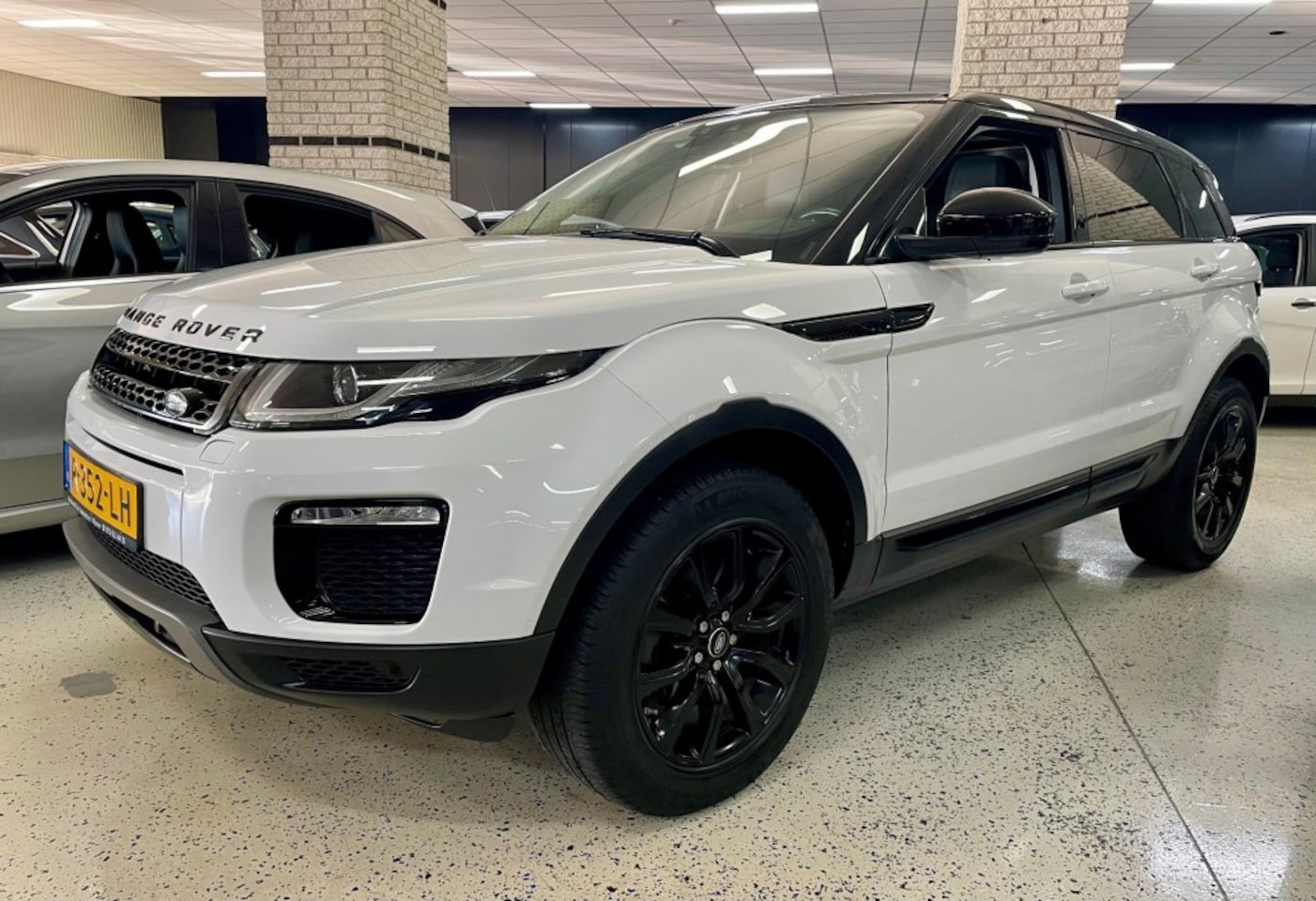 Land Rover Range Rover Evoque - 2.0 Si4 HSE AWD 241pk Panorama dak Leder Xenon Trekhaak Afn. Nav - AutoWereld.nl