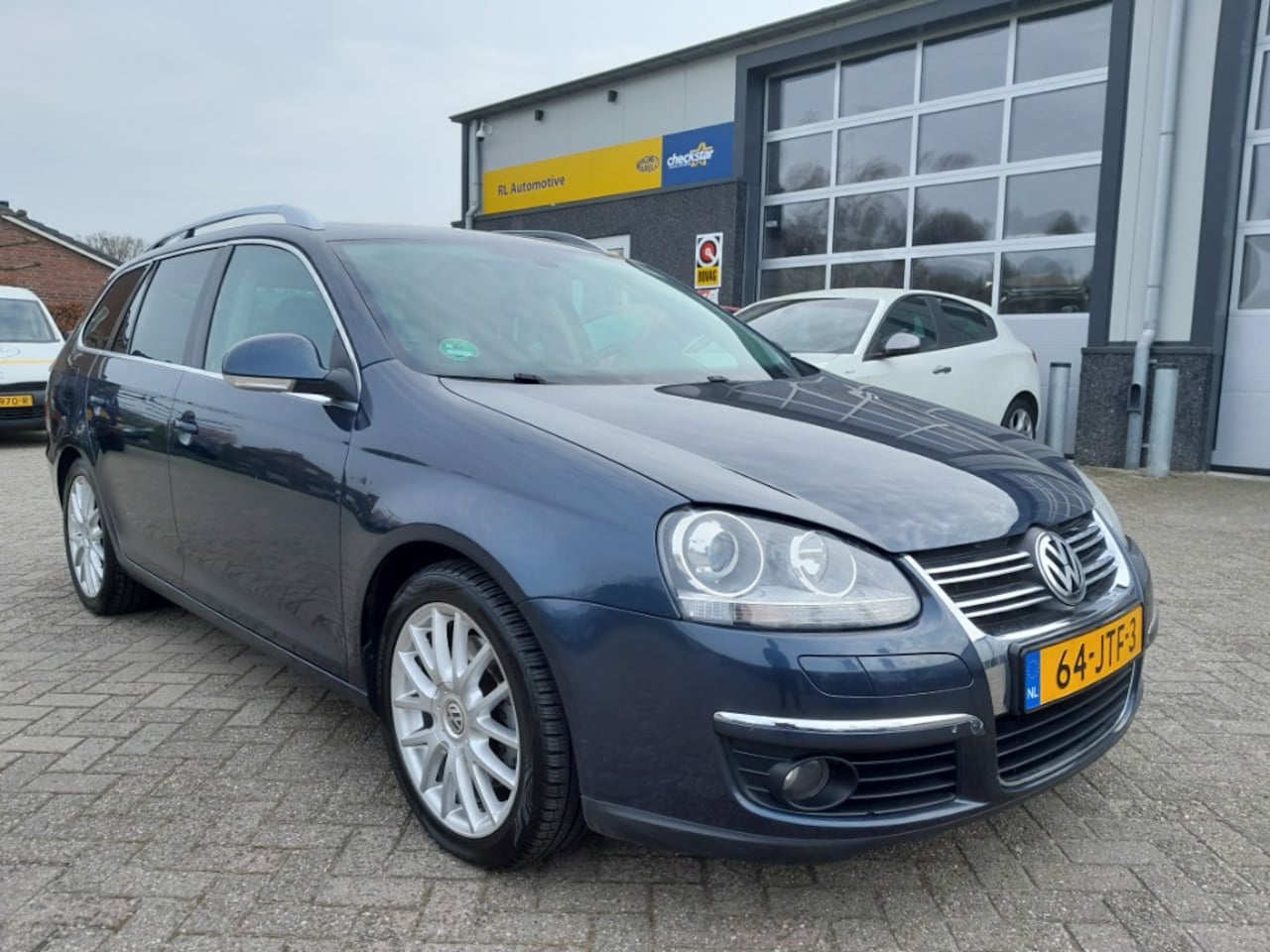 Volkswagen Golf Variant - 1.4 TSI Highline - Xenon - Navi - Trekhaak - AutoWereld.nl