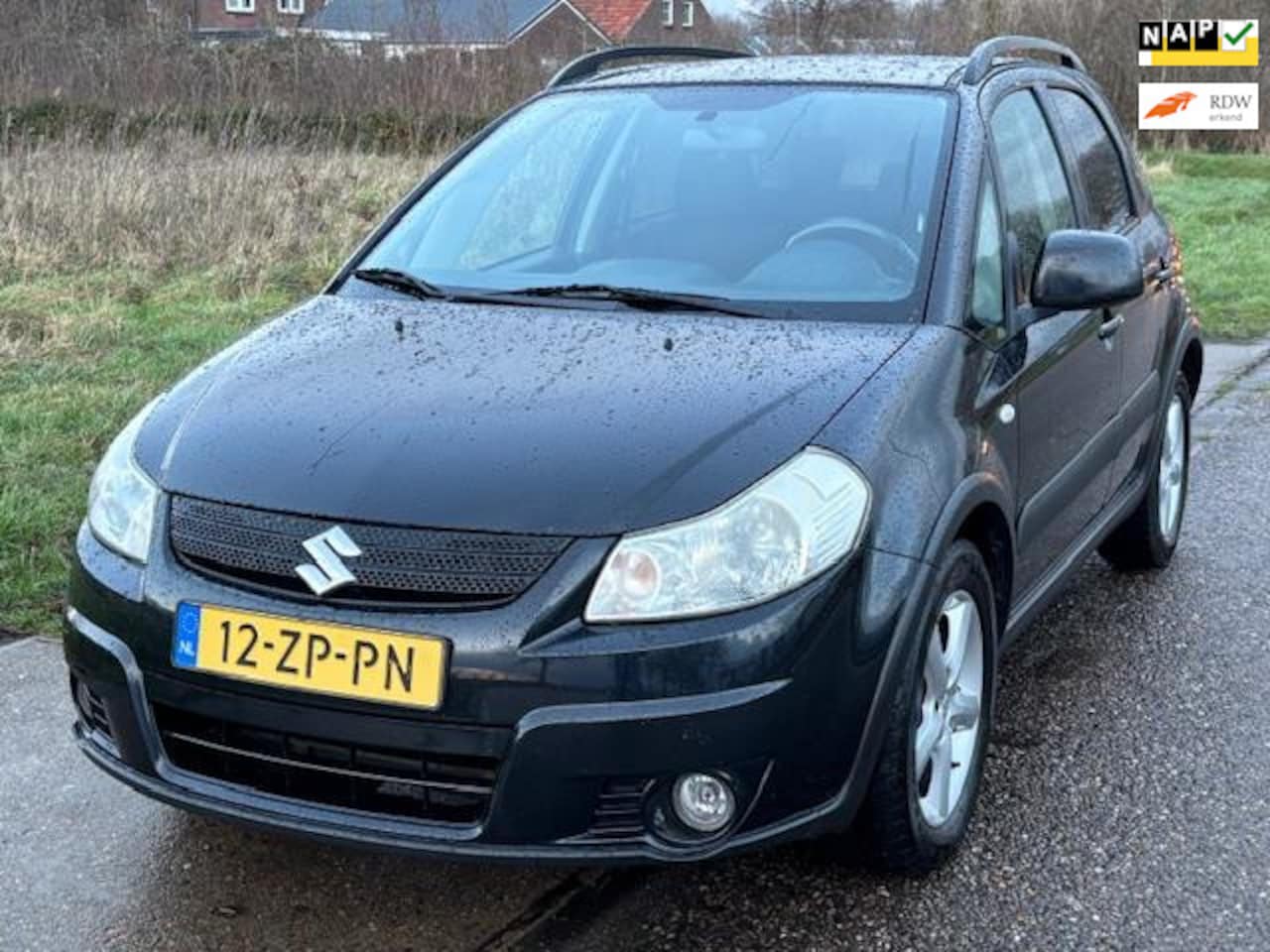 Suzuki SX4 - 1.6 Shogun 5-Drs Airco Electric pakket Audio-CD/MP3 LMV 16" Afneembare trekhaak ABS EBD De - AutoWereld.nl