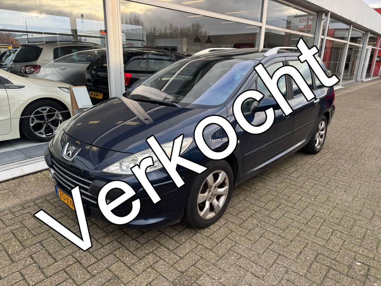 Peugeot 307 SW - 2.0-16V Premium | 3e eigenaar| Automaat | Airco | Voorzien van trekhaak | Dakrails | Cruis - AutoWereld.nl