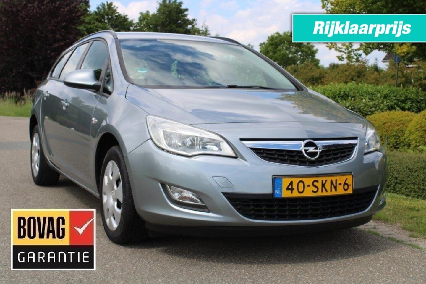 Opel Astra Sports Tourer - Sports Tourer 1.4 100pk Edition airco/cruise/elek pakket - AutoWereld.nl