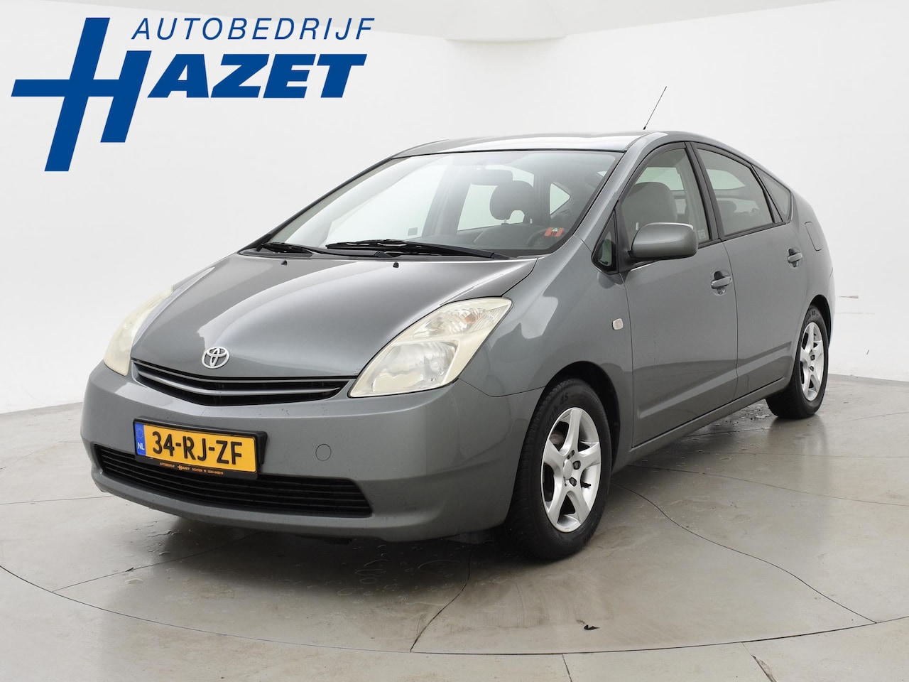 Toyota Prius - 1.5 VVT-i HYBRID AUT. + FIETSENDRAGER | AFN. TREKHAAK | CLIMATE | CRUISE CONTROL - AutoWereld.nl