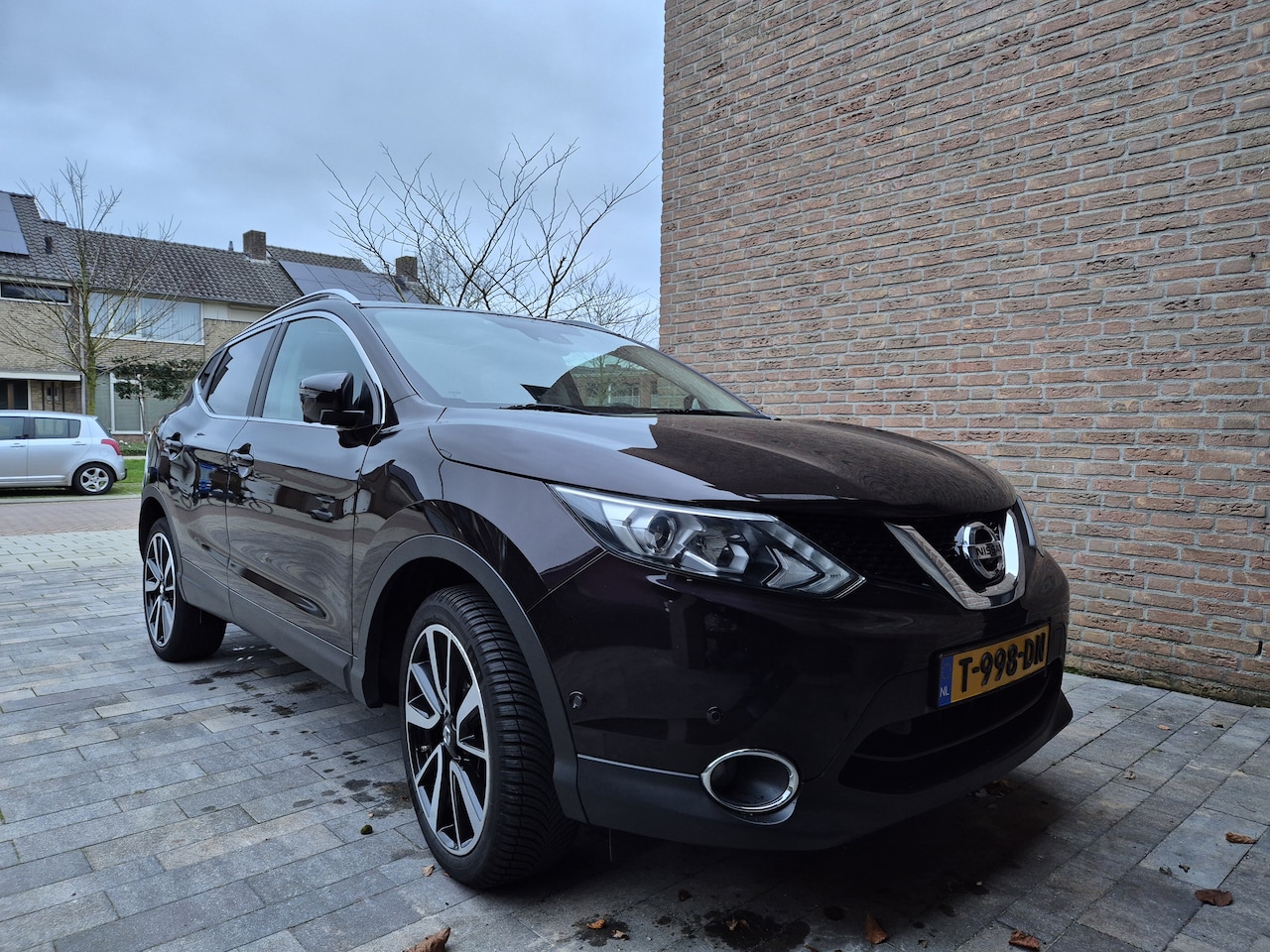 Nissan Qashqai - 1.2 Tekna Panoramadak, afneembare trekhaak leren bekleding, stoelverwarming - AutoWereld.nl