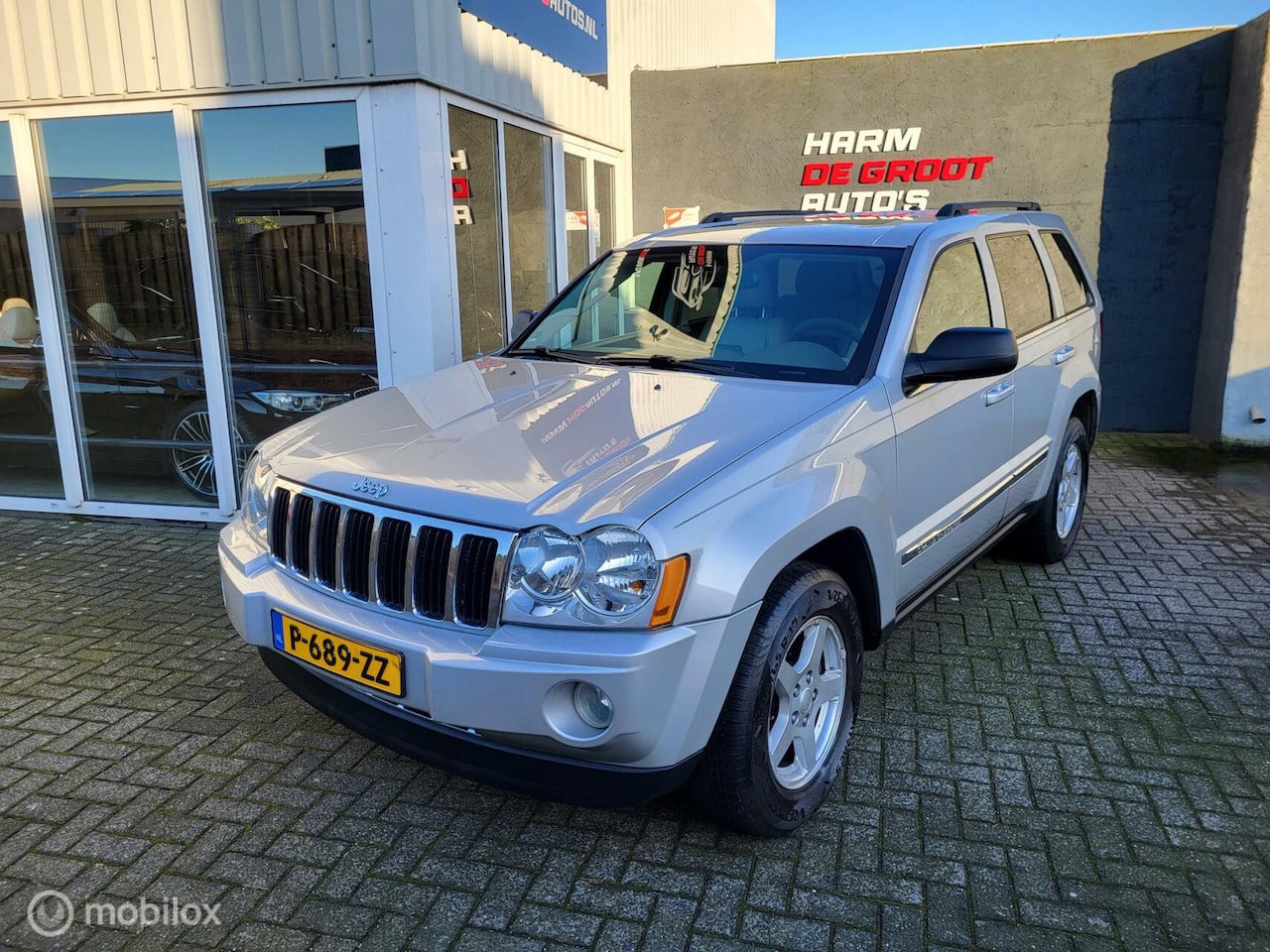 Jeep Grand Cherokee - 4.7i V8 LPG/Youngtimer/Carplay/Schuifdak - AutoWereld.nl