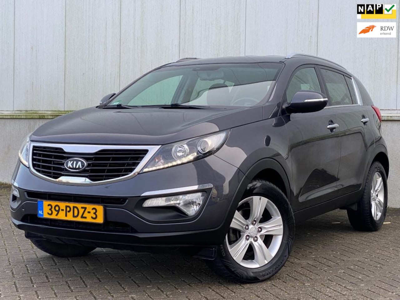 Kia Sportage - 2.0 X-ecutive Plus Pack NAP I LEER I TREKHAAK I 2 EIGENAREN I NETTE AUTO - AutoWereld.nl