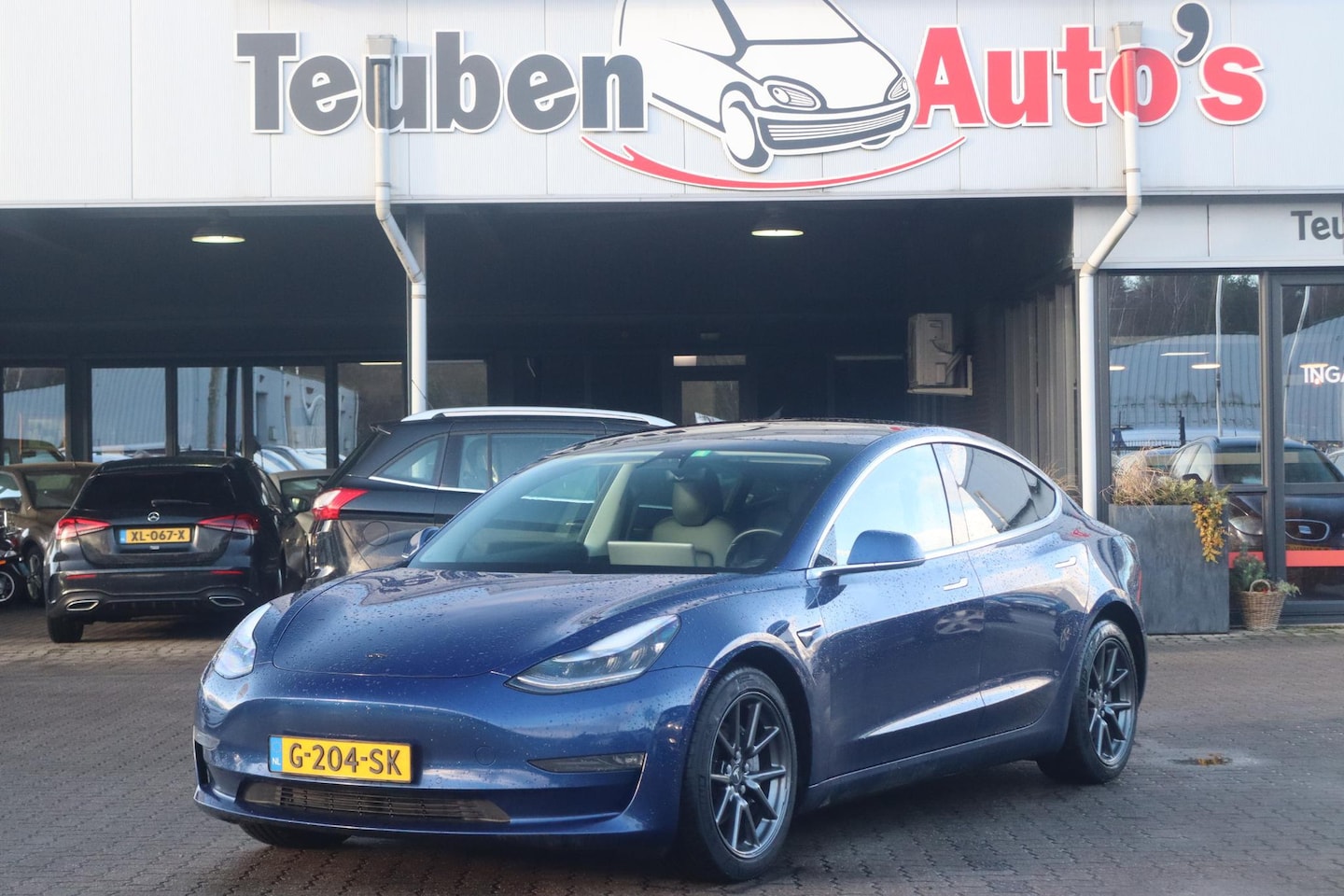 Tesla Model 3 - Long Range RWD Long Range AWD 75 kWh BTW Auto, Panoramadak, Lederen interieur, Autopilot, Navigatie, BTW - AutoWereld.nl