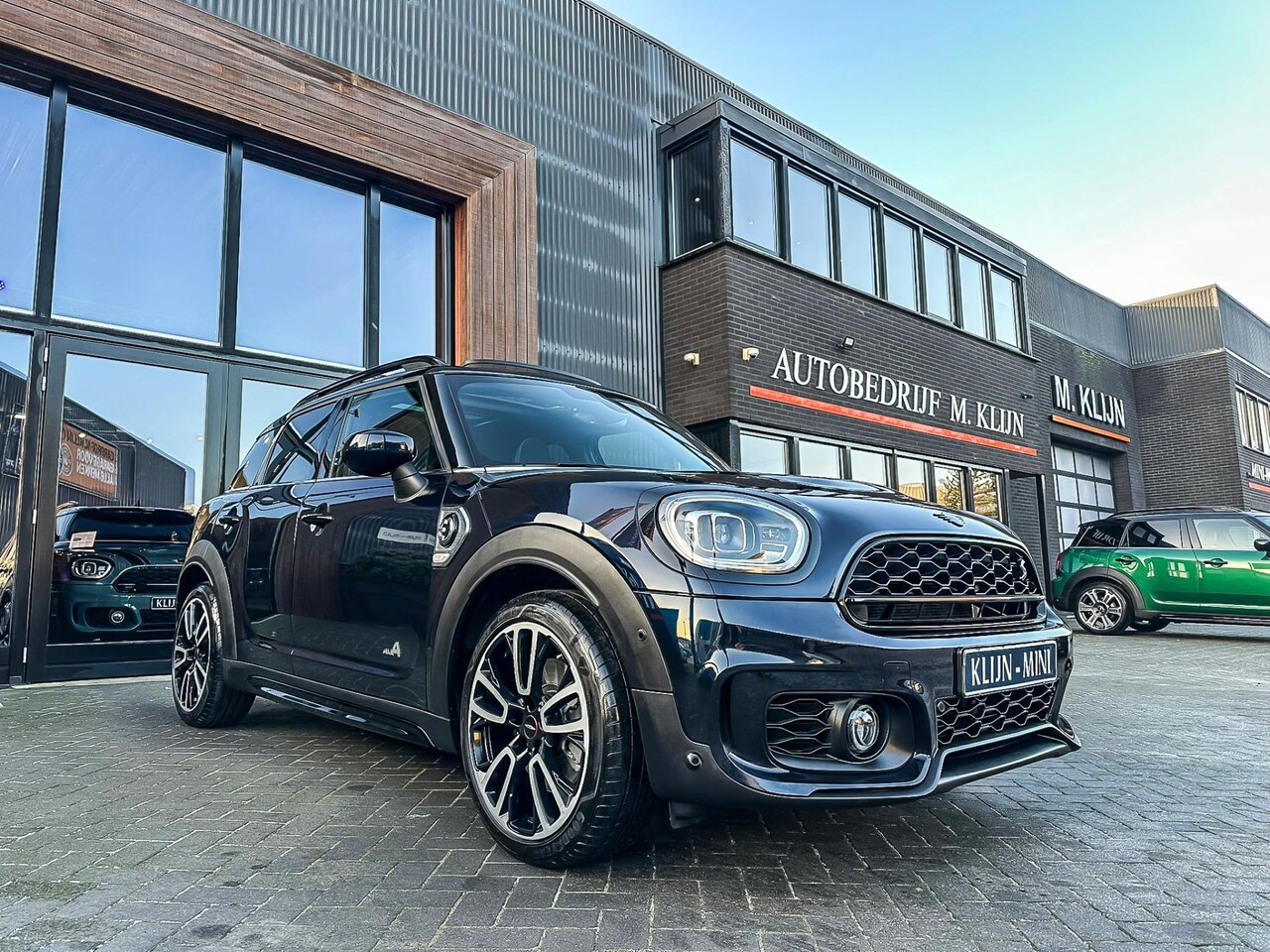 MINI Countryman - Mini 2.0 Cooper S E ALL4 John Cooper Works 220pk/HK/camera/19"Jcw/btw - AutoWereld.nl