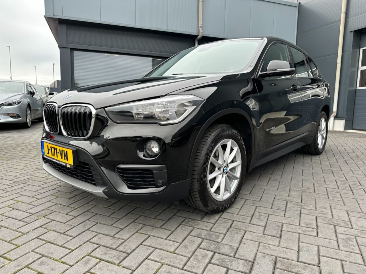 BMW X1 - X1 sDrive 1.8i High Executive Aut. Navigatie - AutoWereld.nl