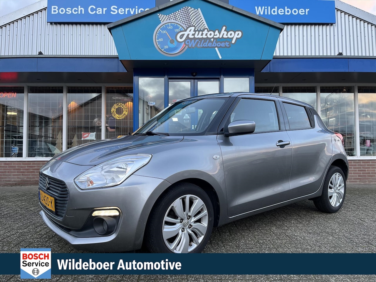 Suzuki Swift - 1.2 90 PK Select + AIRCO + STOELVERWARMING + NAVIGATIE + ELEK RAMEN + LMV - AutoWereld.nl