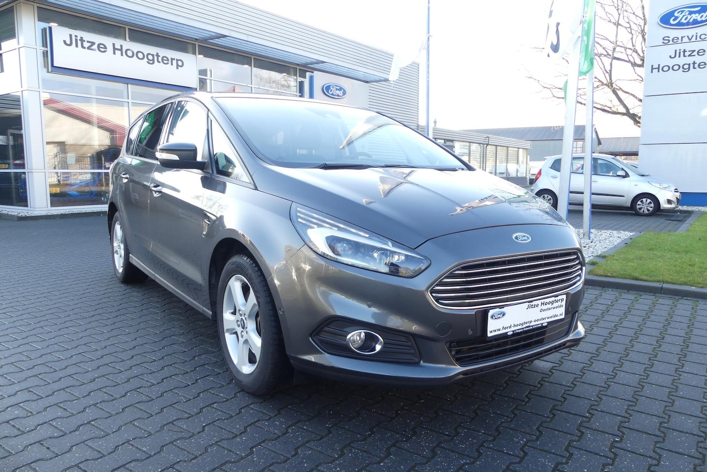 Ford S-Max - 1.5 Titanium 7p. 160PK.7 PERSOONS.NAVI.CRUISE.KEYLESS.WINTERPACK.CAMERA.ELEKTR AKLEP. - AutoWereld.nl