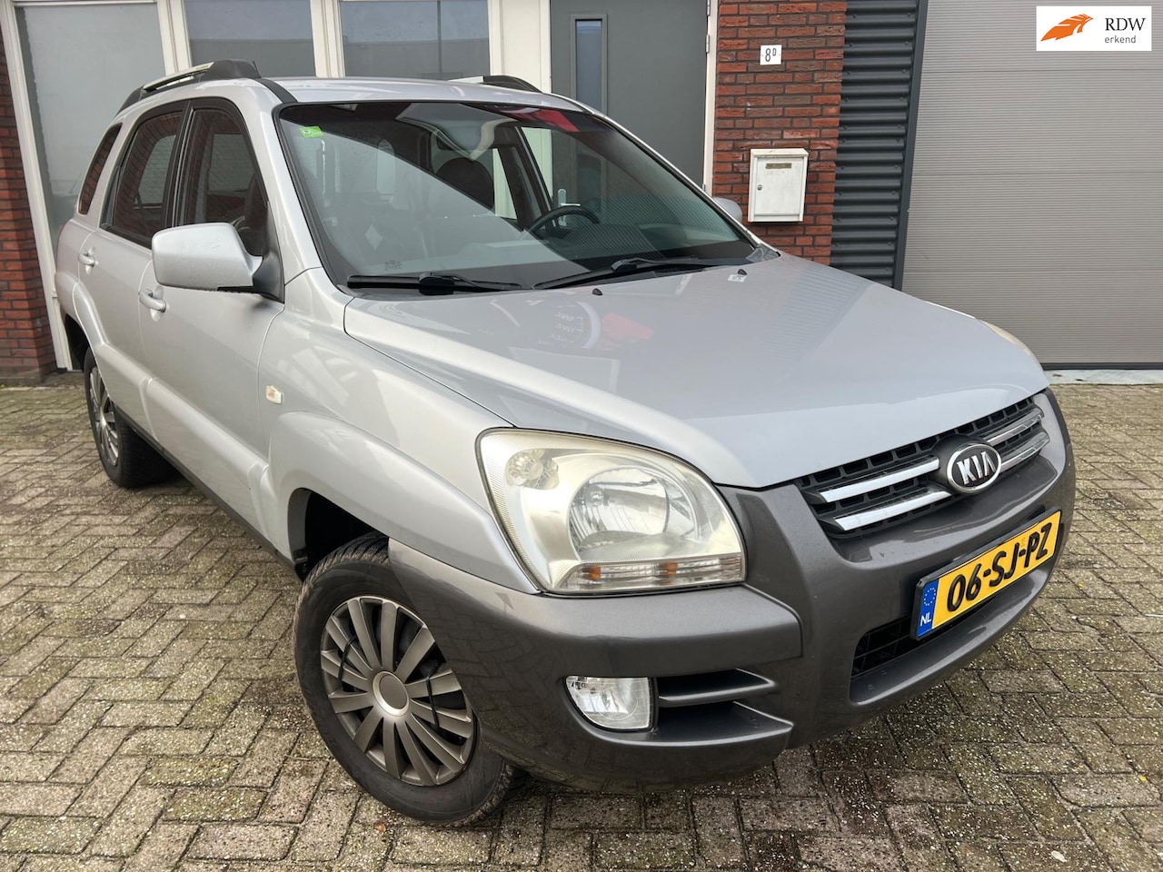 Kia Sportage - 2.0 CVVT Executive / Leder / PDC / Clima / Cruise / NAP - AutoWereld.nl