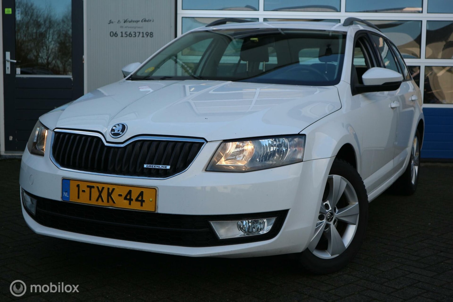 Skoda Octavia Combi - 1.6 TDI Greenline ECC/NAVIGATIE/PDC/LMV - AutoWereld.nl