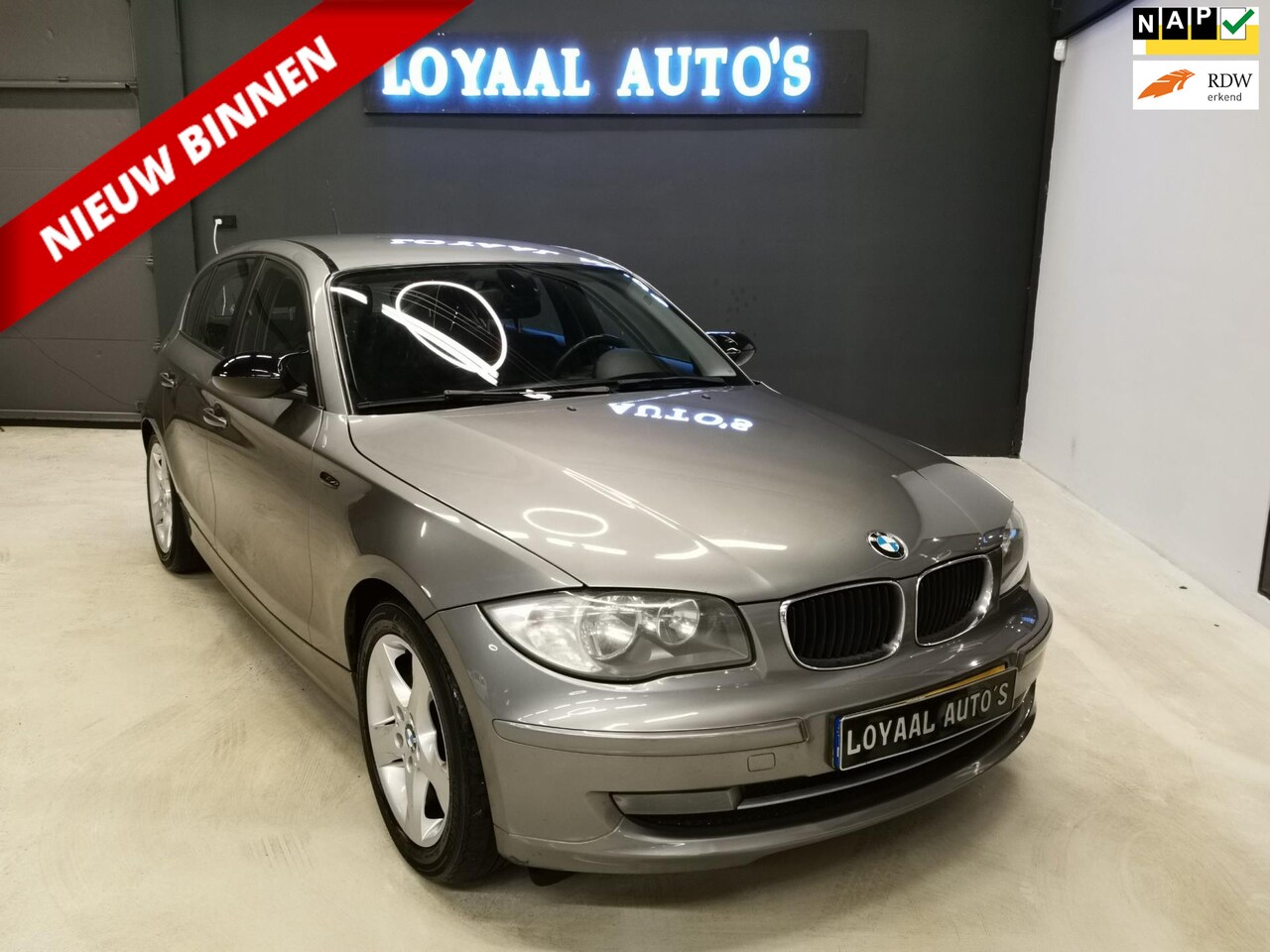 BMW 1-serie - 118i Business Line | AIRCO | CRUISE | ELEK.RAMEN | NAP | APK. - AutoWereld.nl