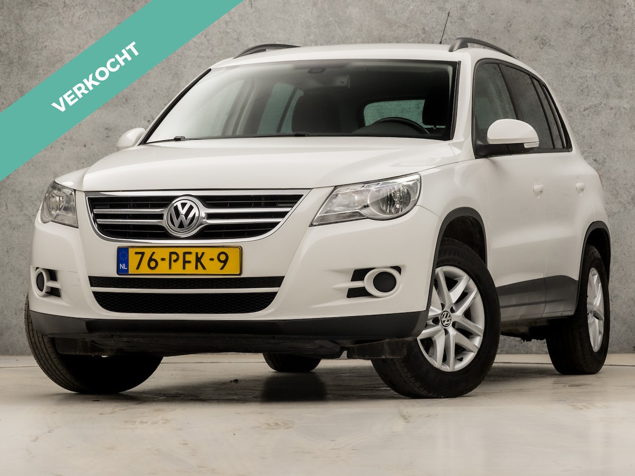 Volkswagen Tiguan - 1.4 TSI Comfort&Design (NAP, CLIMATE, GETINT GLAS, SPORTSTOELEN, ARMSTEUN, CRUISE, TREKHAA - AutoWereld.nl