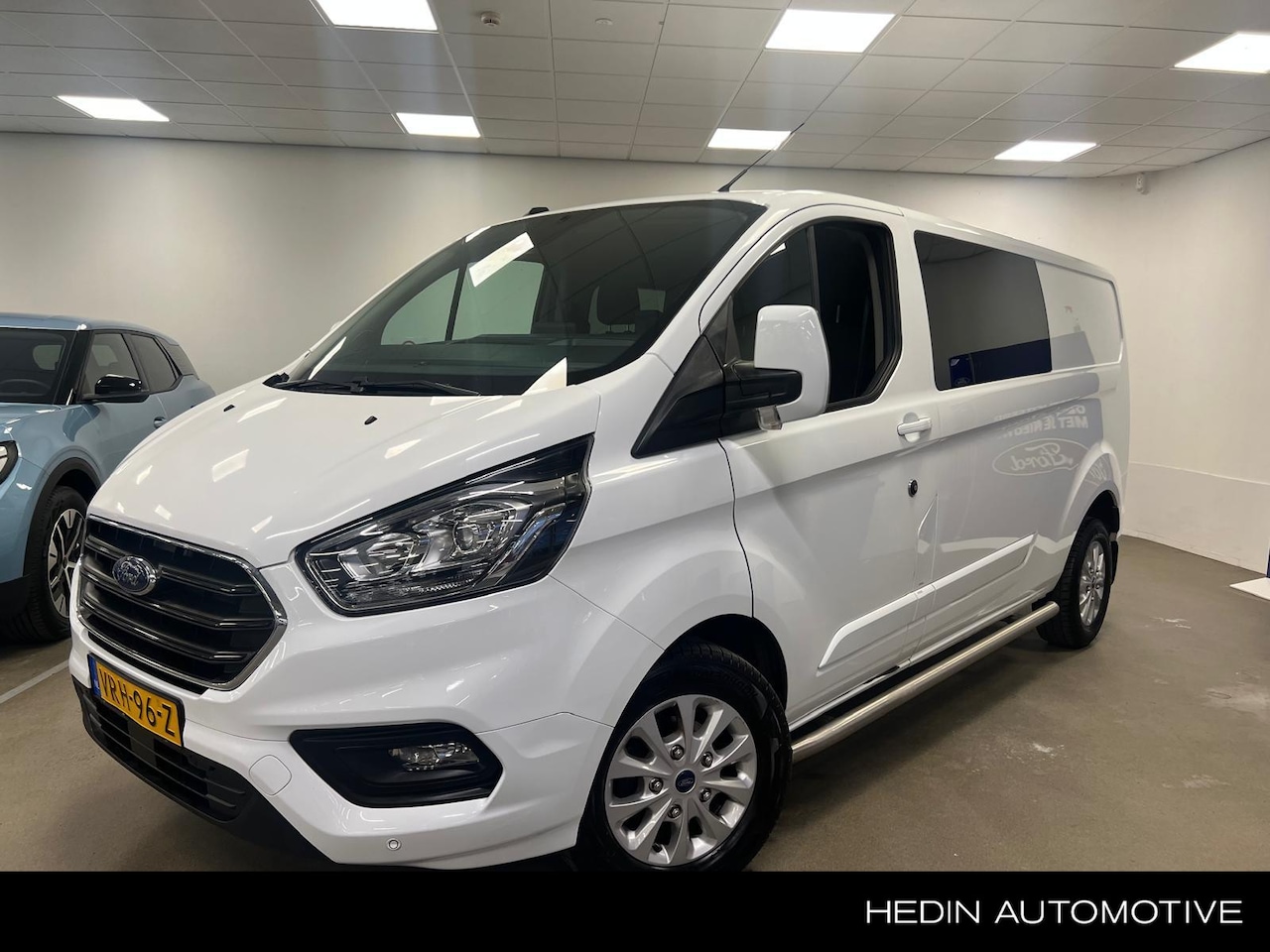 Ford Transit Custom - 300 L2H1 Limited DC | 6-zits | Sidebars | Stoelverwarming | Airco - AutoWereld.nl