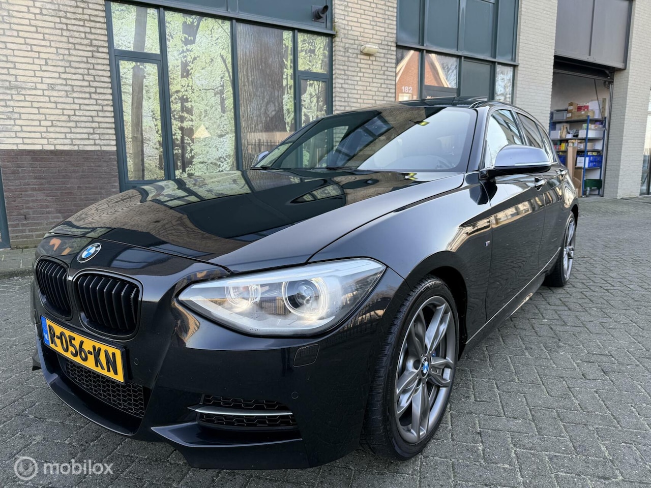 BMW 1-serie - M135i xDrive|M-pakket|Schuifdak|F20 F21|Xenom| - AutoWereld.nl