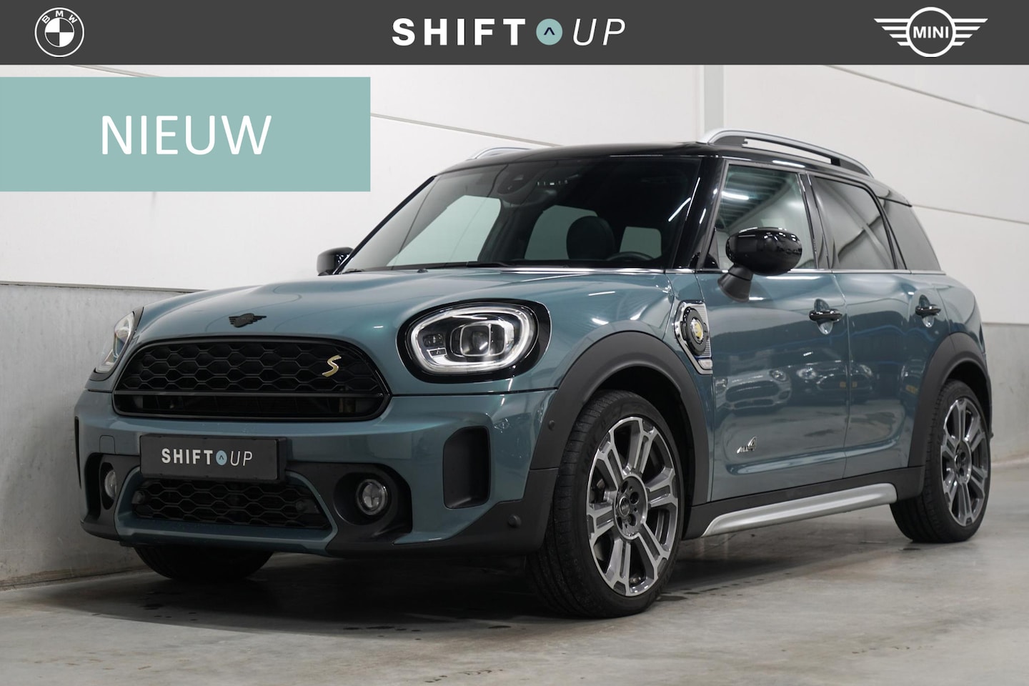 MINI Countryman - Mini 2.0 Cooper S E ALL4 Panoramadak | Head Up | Adapt. Cruise Control | Stuuverwarming - AutoWereld.nl