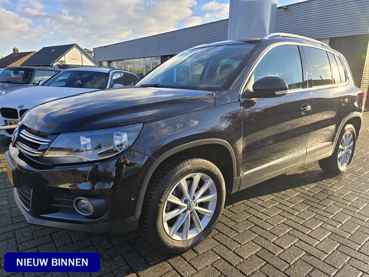 Volkswagen Tiguan - 1.4 TSI Sport&Style / PDC / Climate Control / Bluetooth - AutoWereld.nl