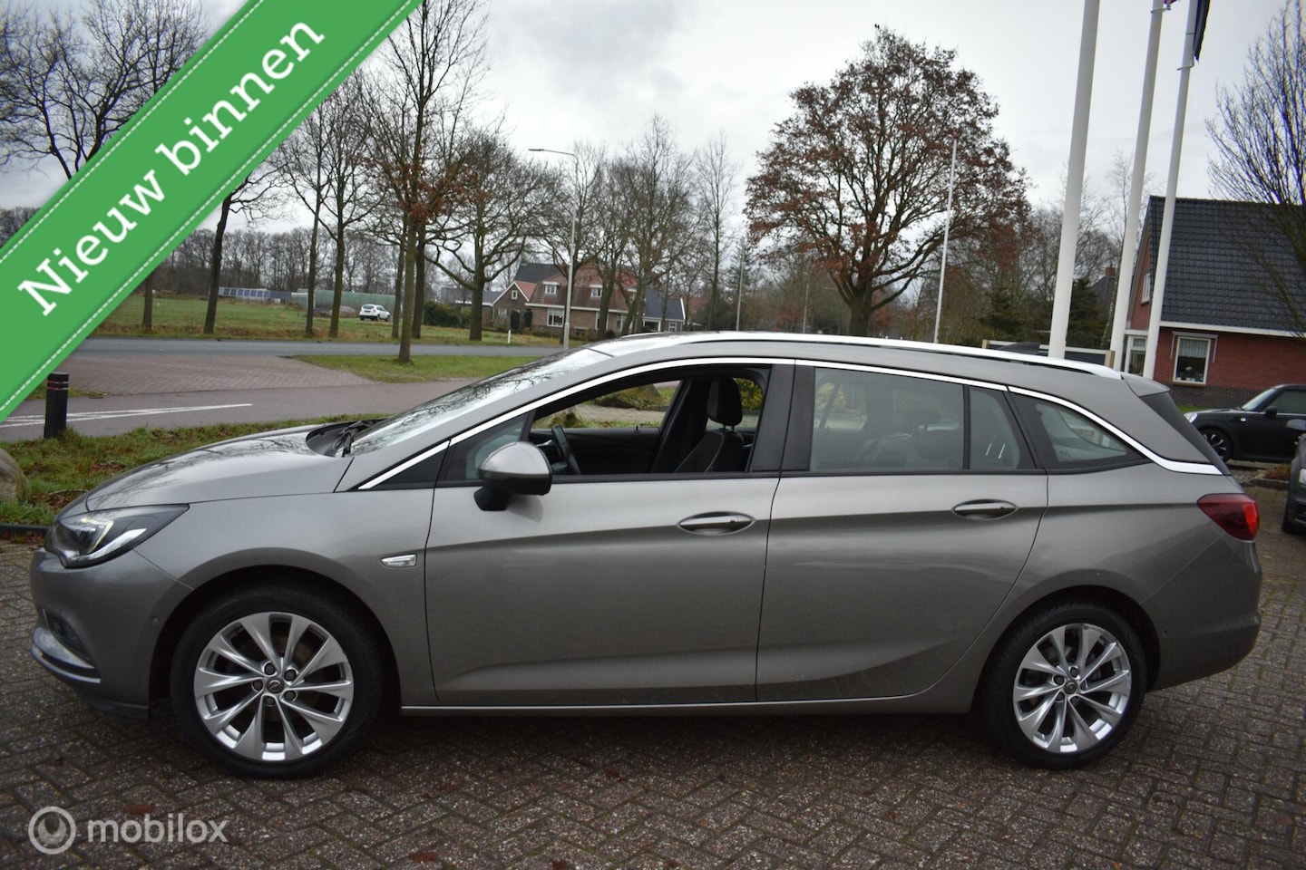 Opel Astra Sports Tourer - 1.4 Turbo 2016|Clima|Cruise|Navi! - AutoWereld.nl