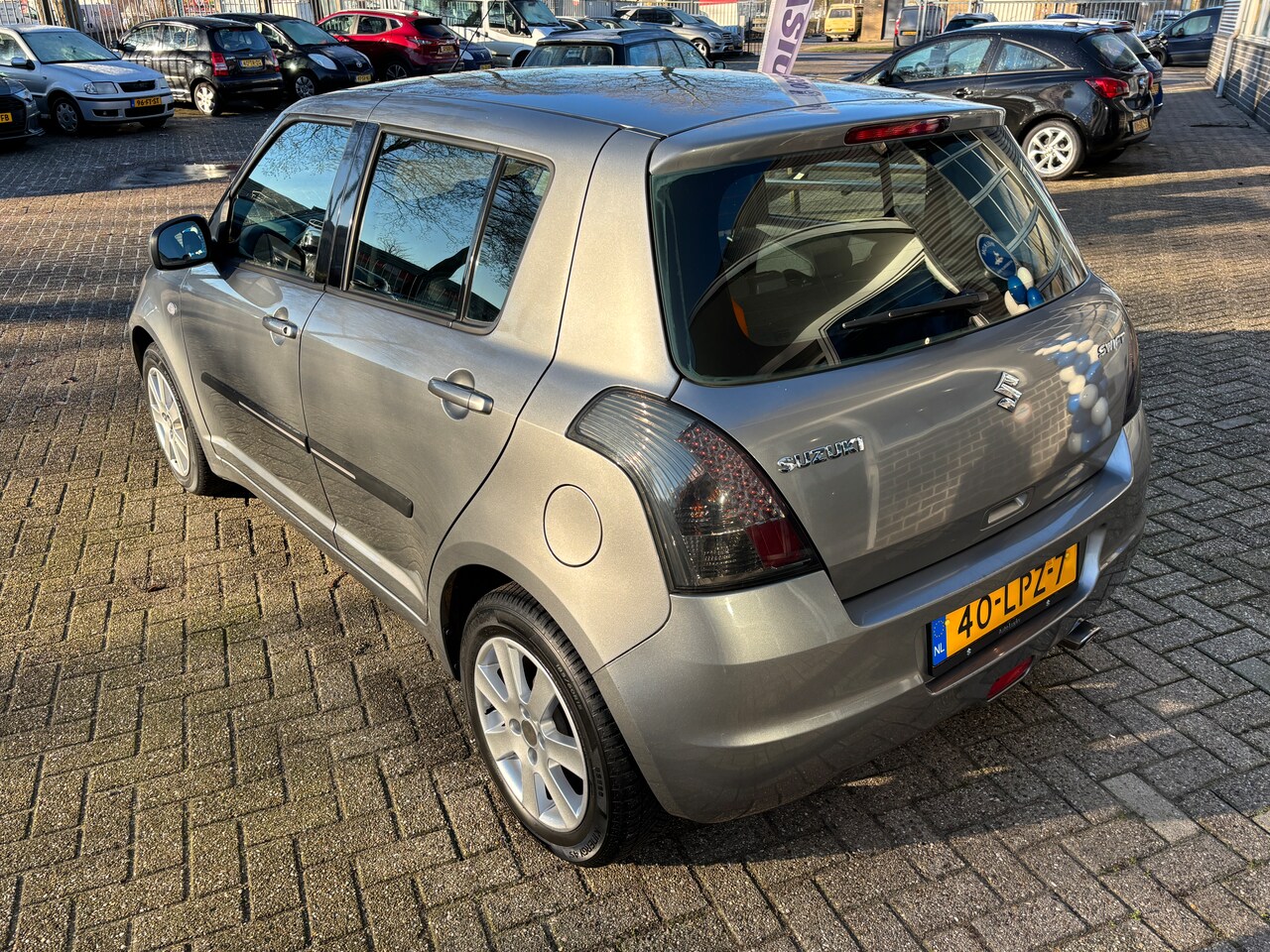 Suzuki Swift - 1.3 Cool | Org-NL auto. 1e eig. Lage km. Airco.