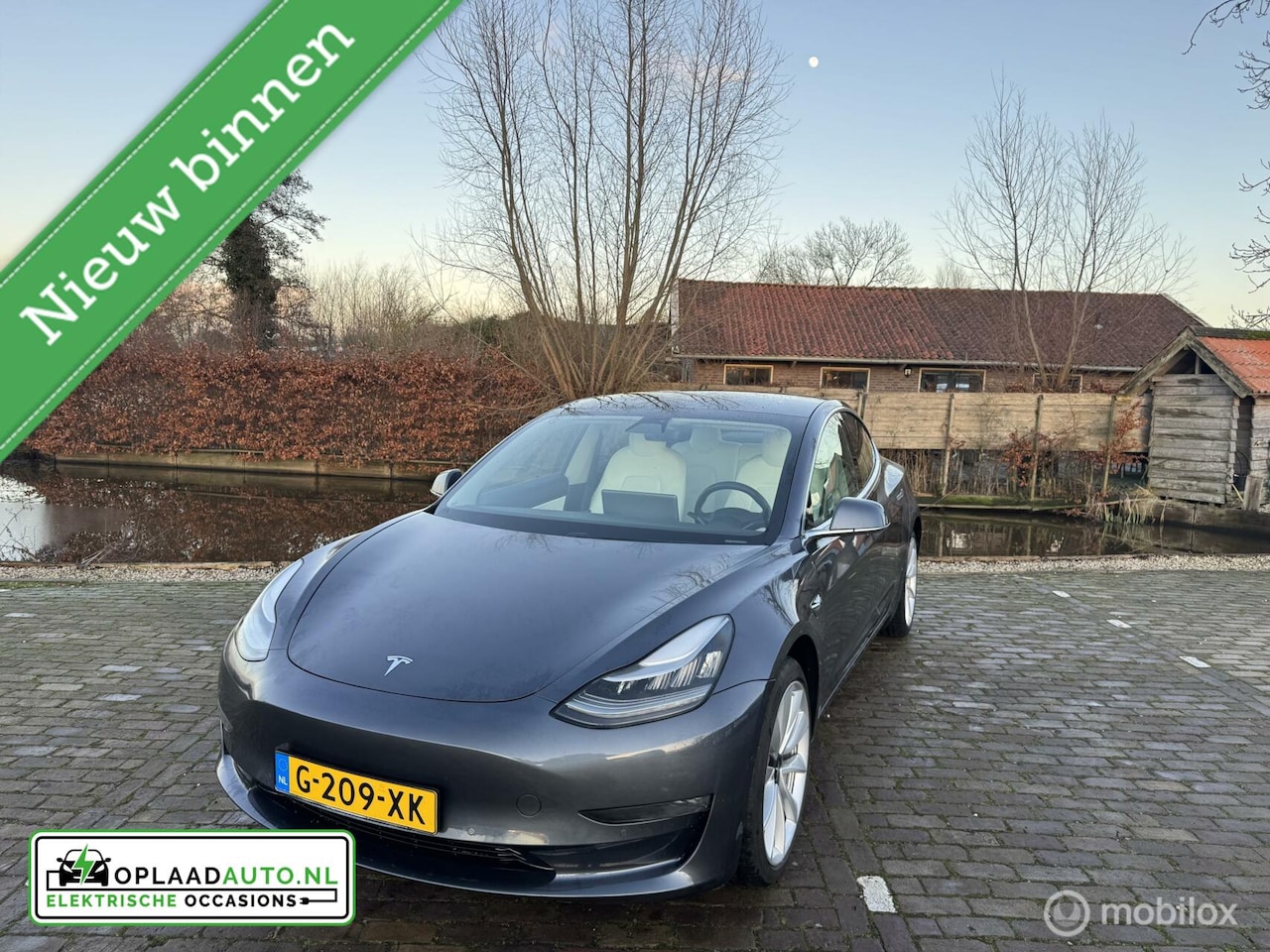 Tesla Model 3 - Long Range RWD Long Range AWD 75 | INCL FSD! | Wit interieur - AutoWereld.nl