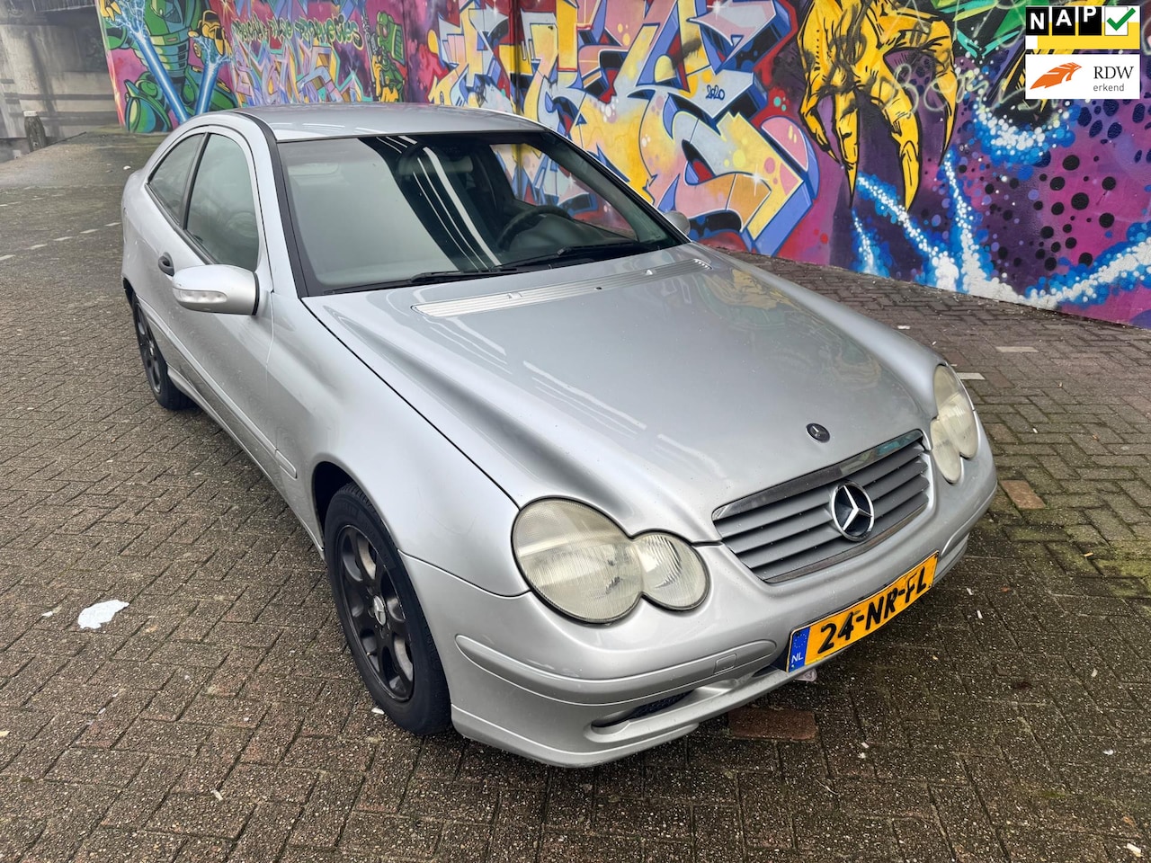 Mercedes-Benz C-klasse Sportcoupé - 180 K. Nette auto geen roest airco stereo auto rijd heel goed boeken aanwezig - AutoWereld.nl