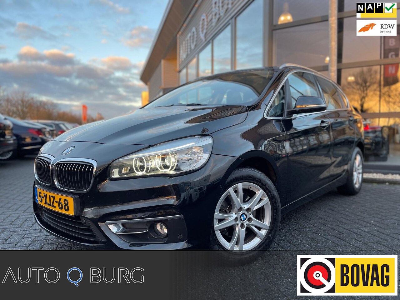 BMW 2-serie Active Tourer - 218d High Executive | Leer | Panorama | Navi | Climate | Stoelverwarming | LED | LMV | PDC - AutoWereld.nl