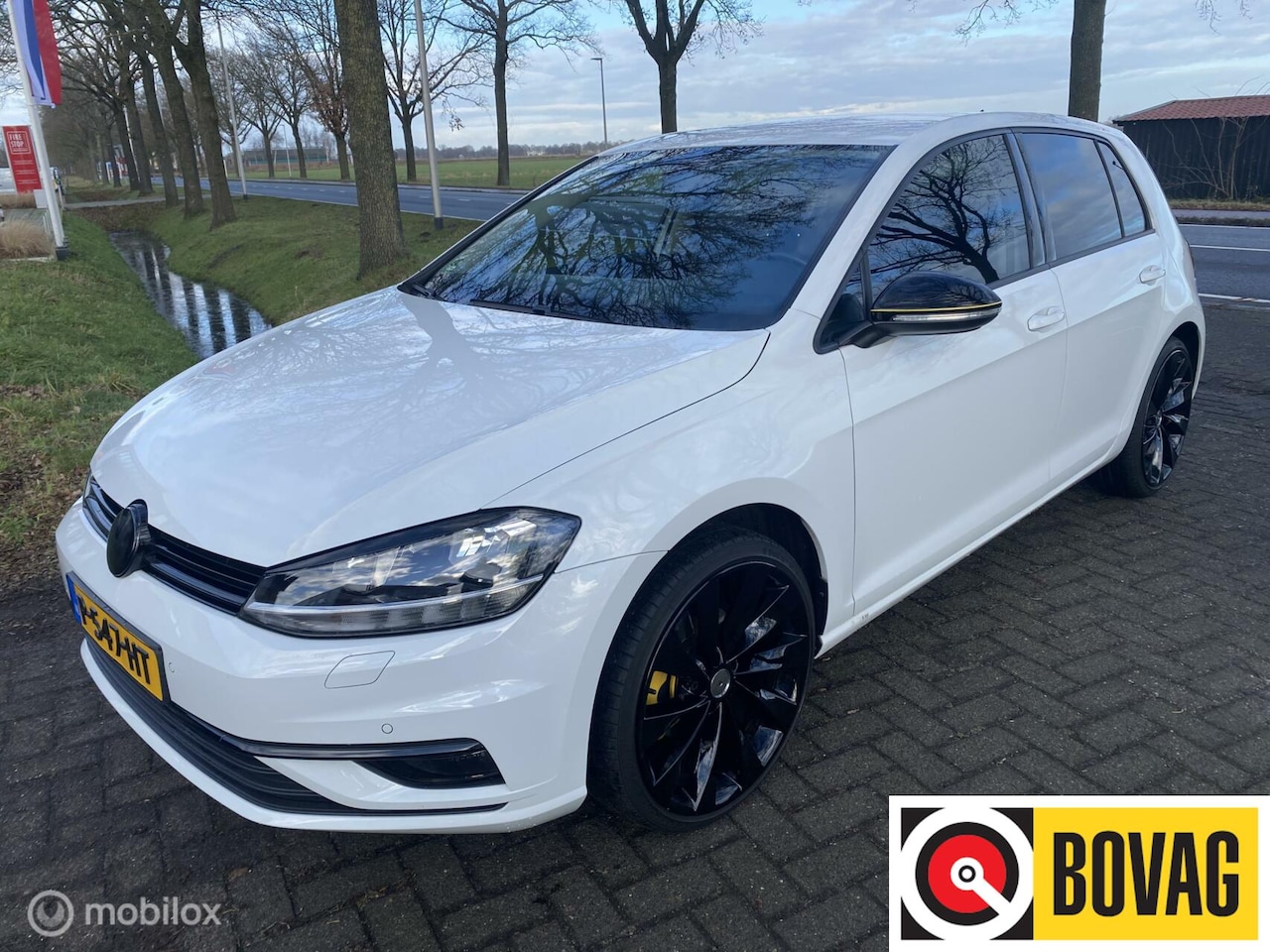 Volkswagen Golf - 7.5 I 1.4 TSI Highline I Navigatie I Sportstoelen I - AutoWereld.nl