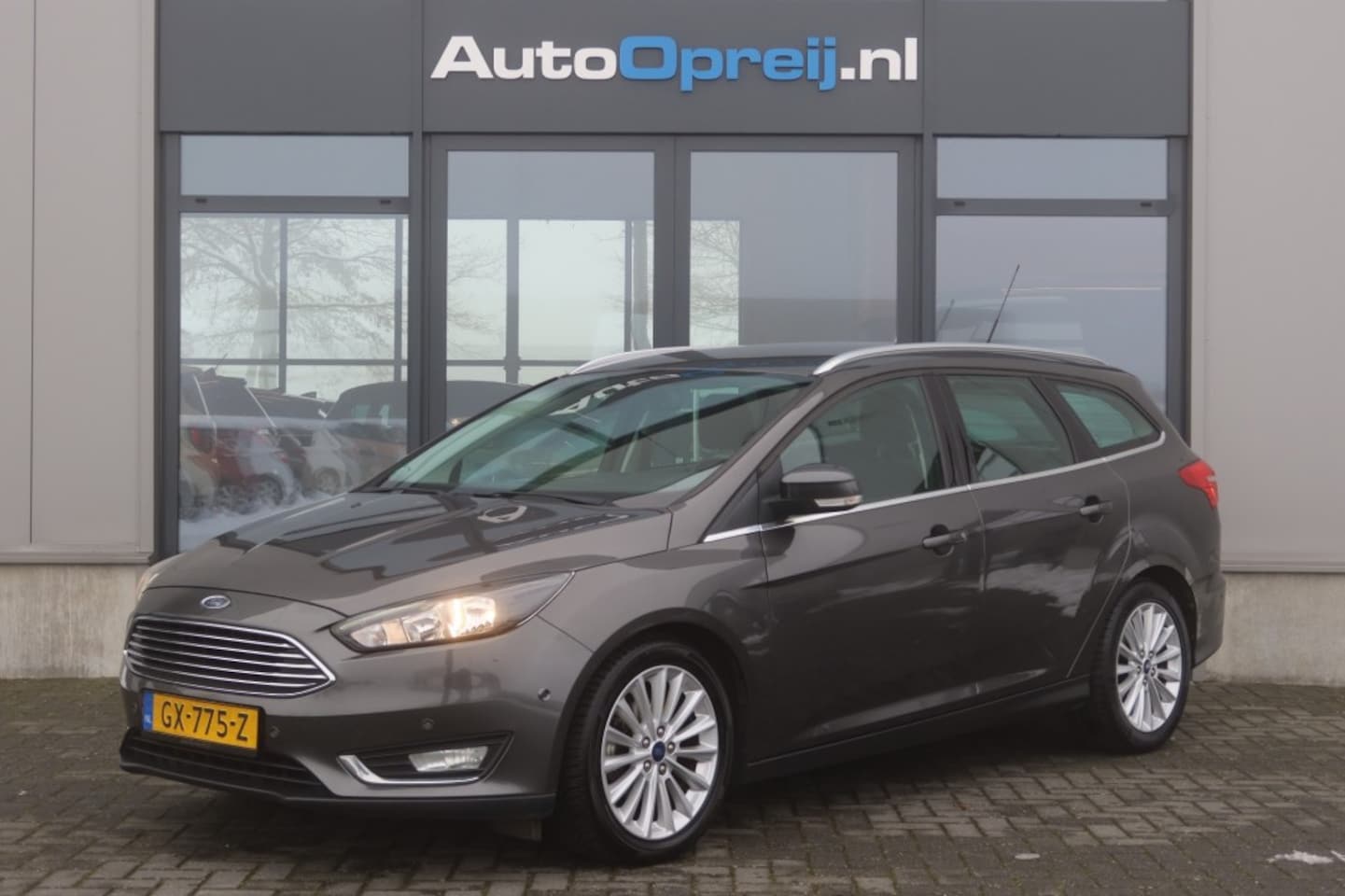 Ford Focus - 1.0 Titanium Edition 125pk Clima, NAVI, Cruise, PDC V+A, 1e eige - AutoWereld.nl