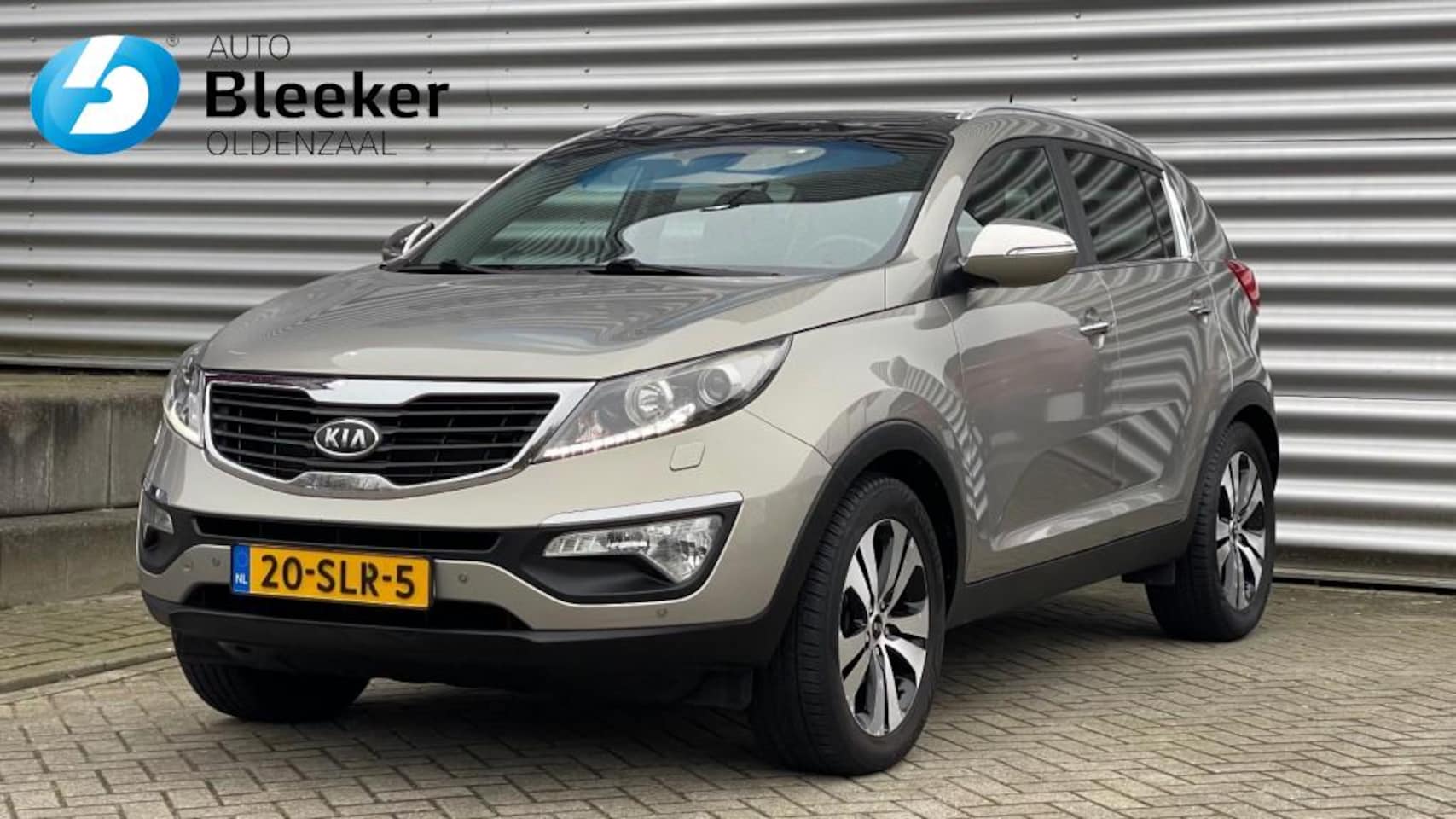 Kia Sportage - 2.0 Automaat X-Clusive Pano Trekhaak Camera Clima Cruise Navi - AutoWereld.nl