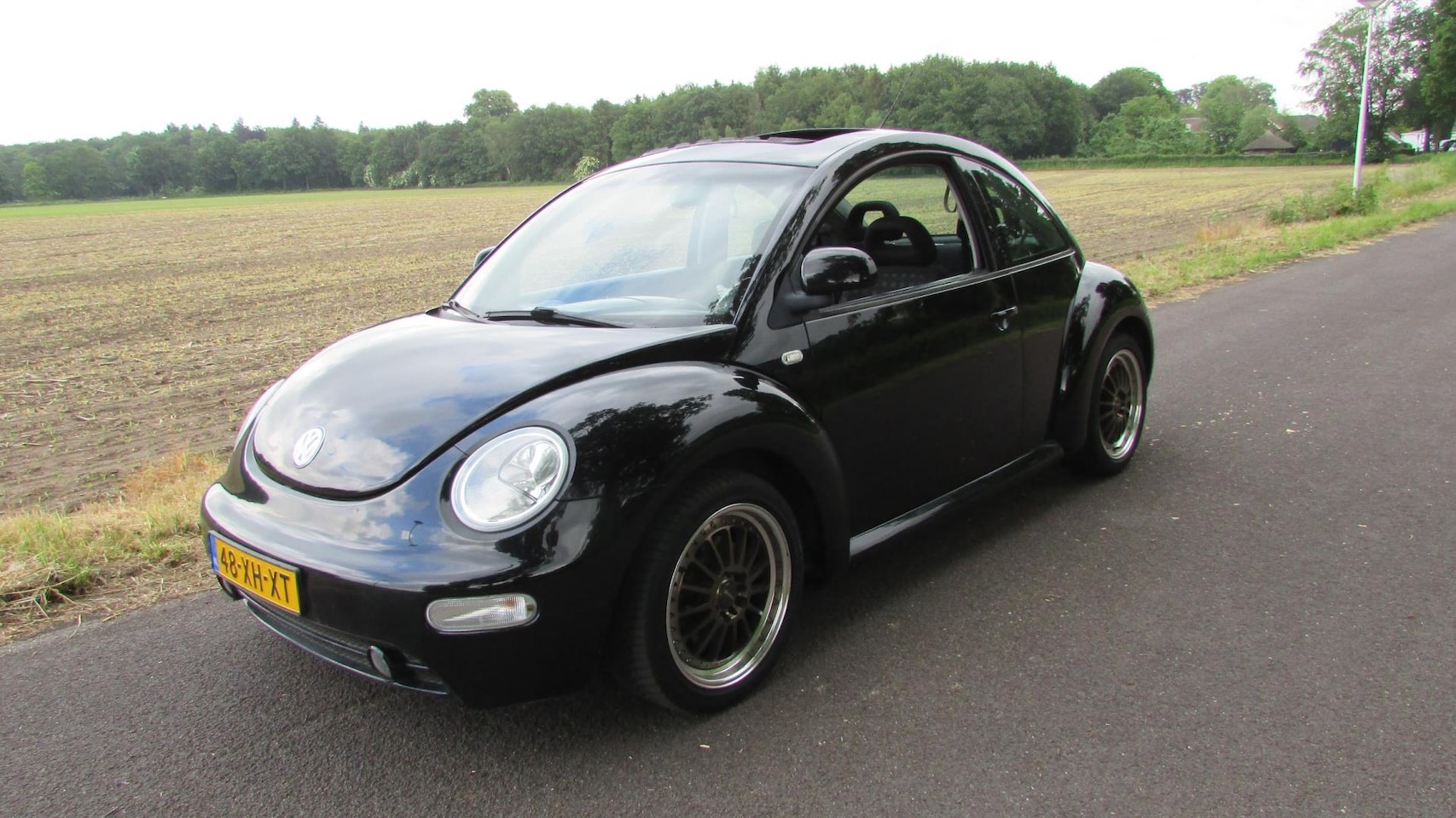 Volkswagen New Beetle - 2.0 Highline 2.0 Highline - AutoWereld.nl