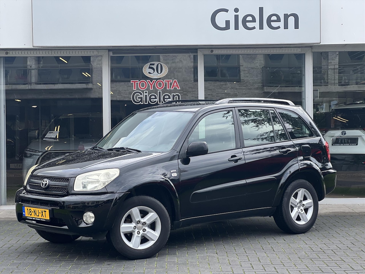 Toyota RAV4 - 2.0 4WD Automaat Sol | Trekhaak, Cruise control, Lichtmetalen velgen, Climate control - AutoWereld.nl