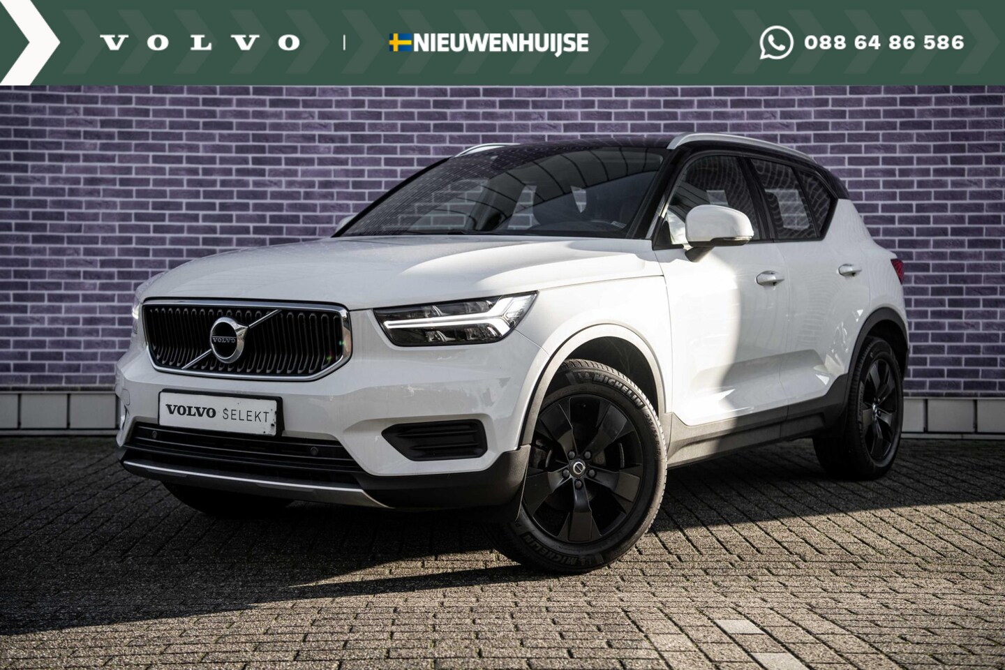 Volvo XC40 - 1.5 T3 Aut. Momentum Pro | BLACK PACK | Trekhaak | Navigatie | Climate Control |  Park ass - AutoWereld.nl