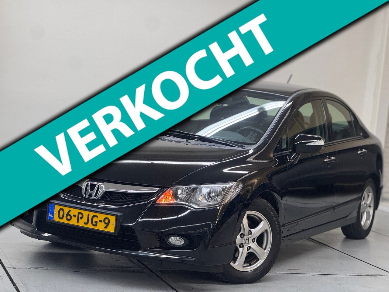 Honda Civic - 1.3 Hybrid Elegance Ecc Lmv Pdc Dealer O.H. - AutoWereld.nl