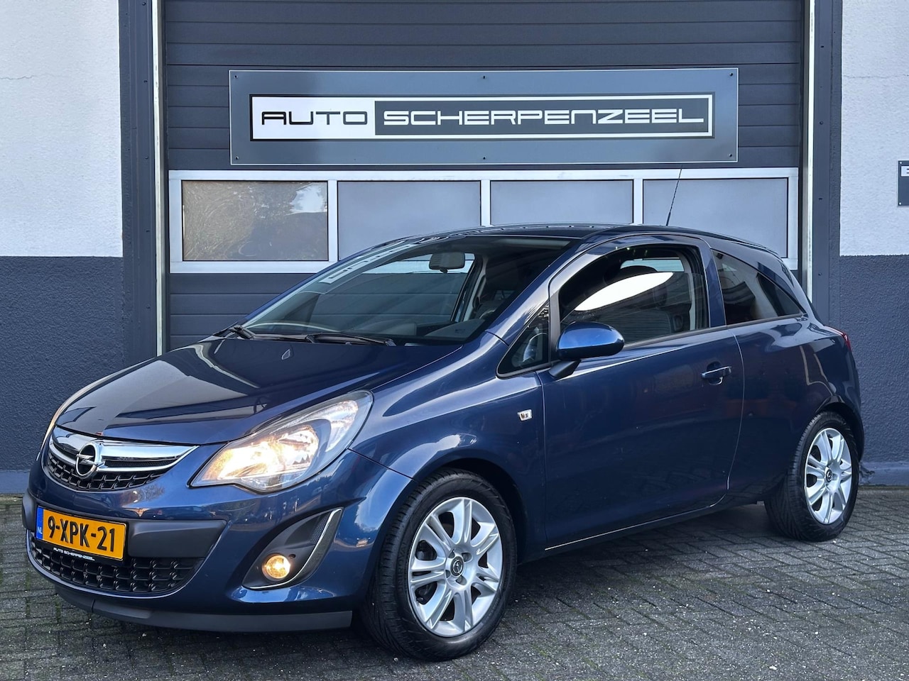 Opel Corsa - 1.4-16V BlitZ I AIRCO I NAVI I TREKHAAK I PDC - AutoWereld.nl