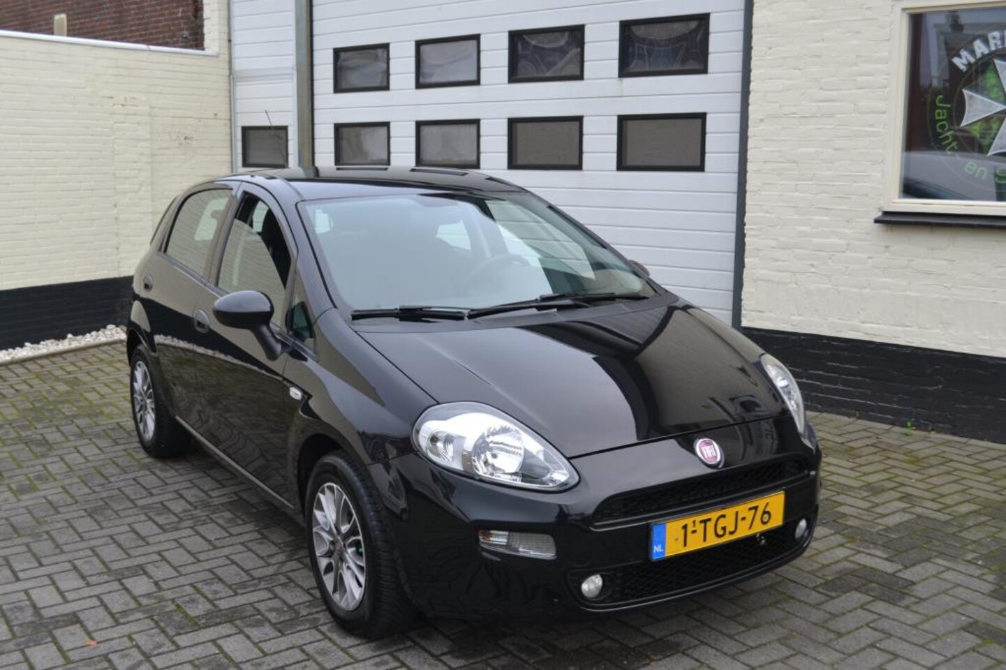 Fiat Punto Evo - 1.2 Pop 4 cylinder Black Edition - AutoWereld.nl