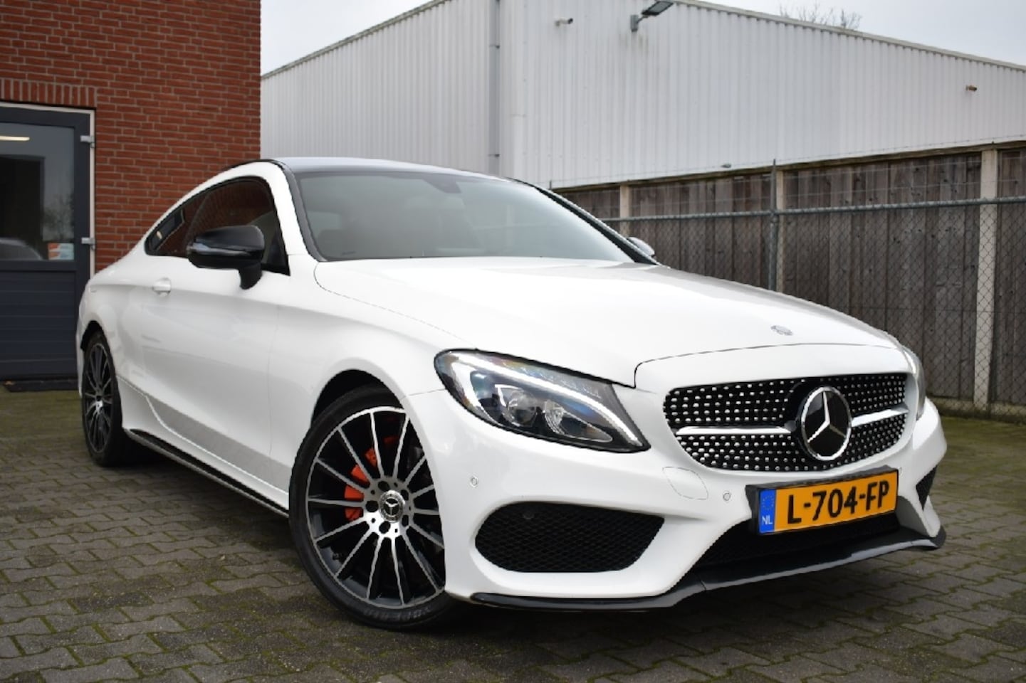 Mercedes-Benz C-klasse Coupé - 220d AMG Panodak|Keyless|19" - AutoWereld.nl