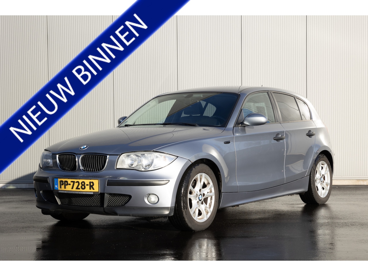 BMW 1-serie - 118i High Executive airco navi camera half leder / youngtimer - AutoWereld.nl