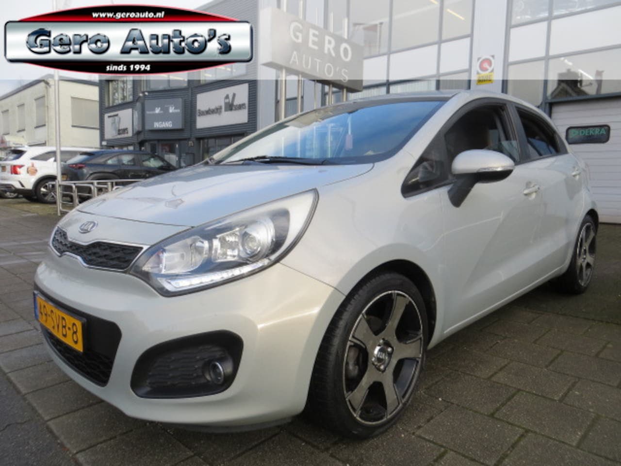 Kia Rio - 1.2 CVVT Super Pack luxe uitvoering airco ecc ,cr control etc - AutoWereld.nl