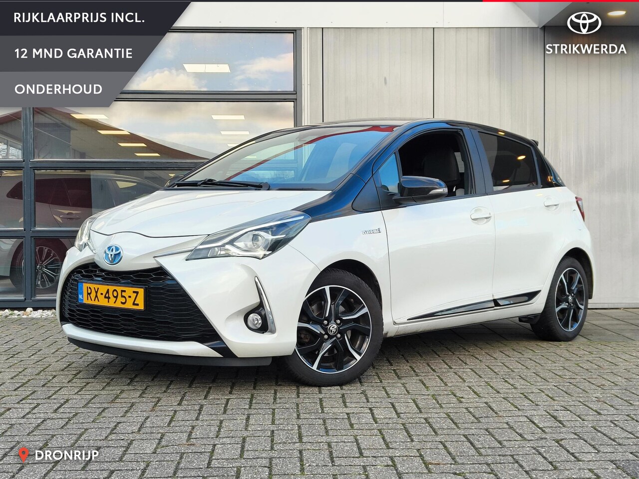 Toyota Yaris - 1.5 Hybrid Bi-Tone | Leer | Clima | Cruise | Camera - AutoWereld.nl