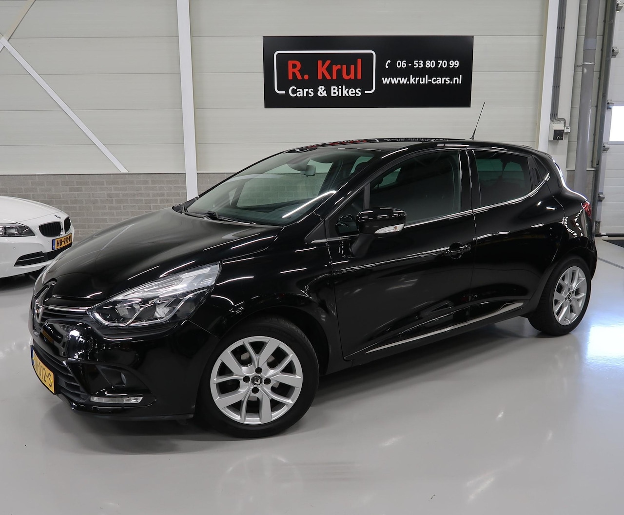 Renault Clio - 0.9 TCe Limited Airco-ecc Navigatie Bluetooth 5-Deurs Sportvelgen NAP Extra getint glas Ap - AutoWereld.nl