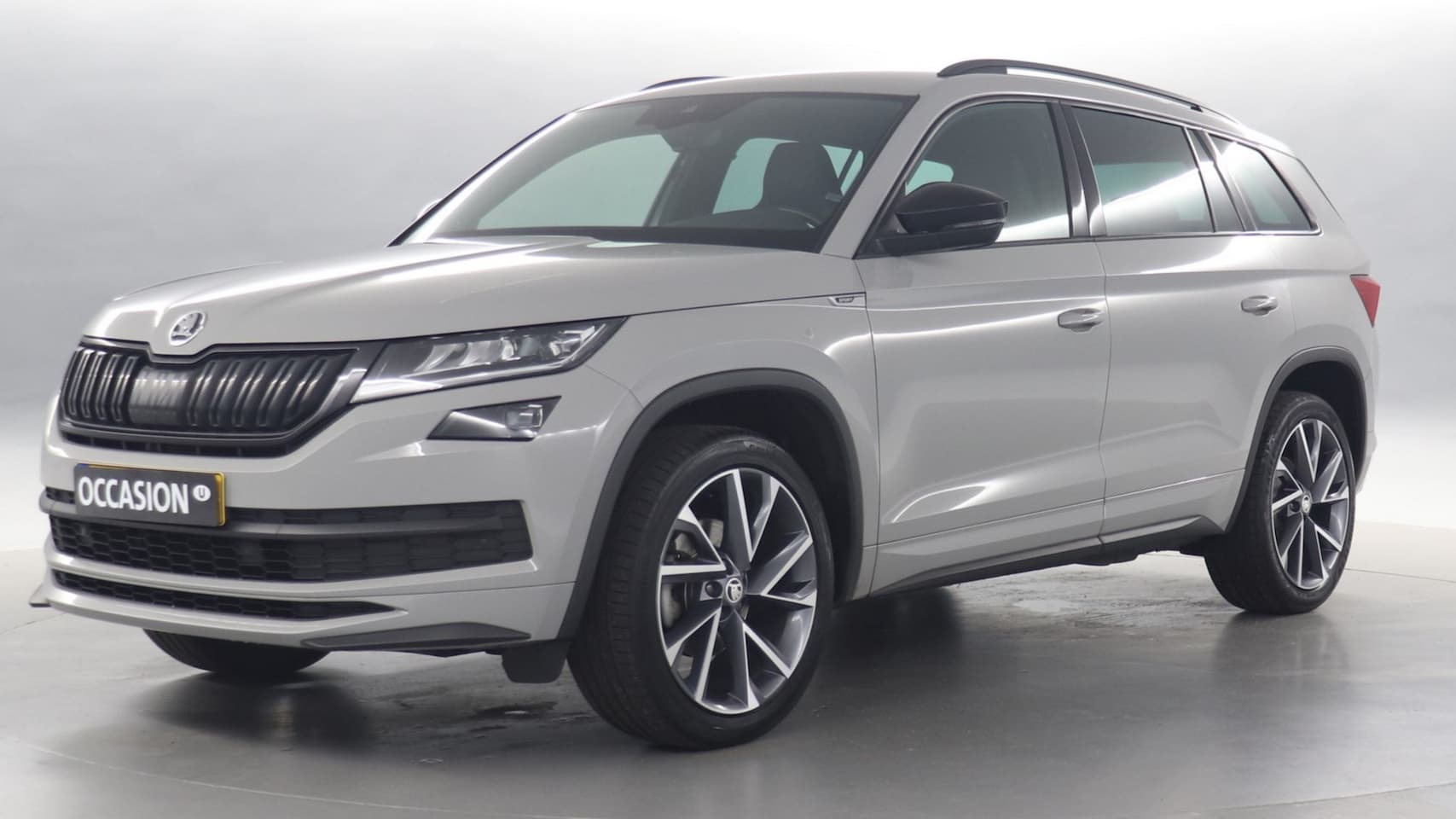 Skoda Kodiaq - 1.5 TSI 150pk Sportline Business DSG / Navigatie / Camera / Stoelverwarming / 20 inch / Tr - AutoWereld.nl