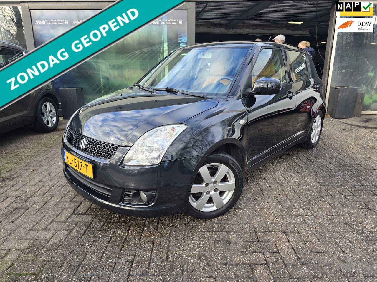 Suzuki Swift - 1.3 Base | 12MND GARANTIE | NW APK | LEDER | KEYLESS | AIRCO | - AutoWereld.nl