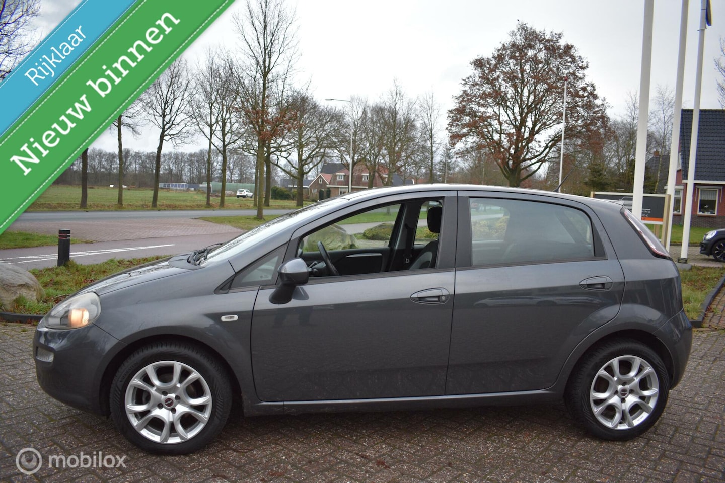 Fiat Punto Evo - 0.9 TwinAir Lounge 5DRS 2013|Clima|Airco|Mooi! - AutoWereld.nl