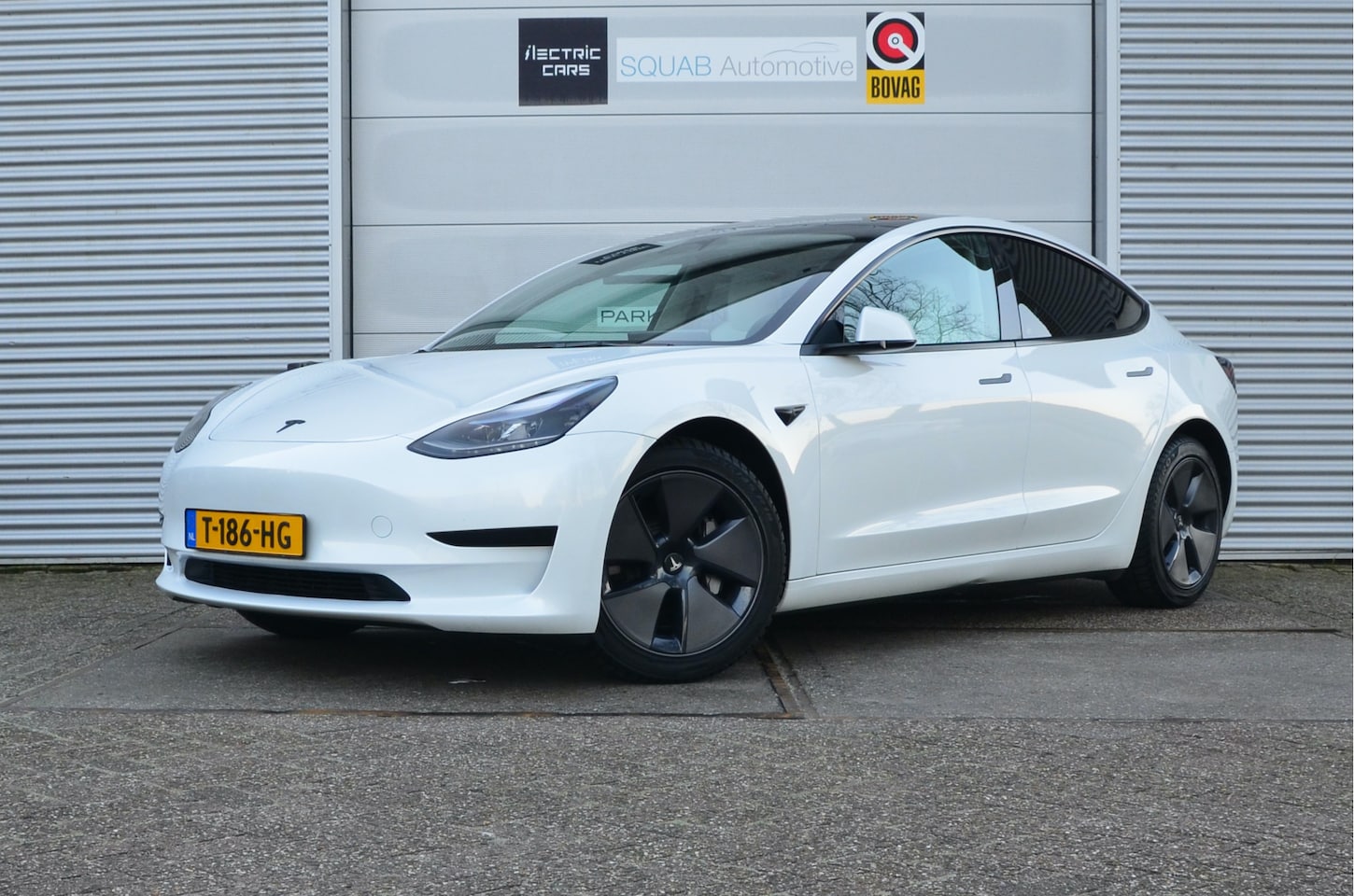 Tesla Model 3 - Standard RWD Plus 60 kWh AutoPilot, Winterbanden, LFP accu, dus 100% opladen! - AutoWereld.nl