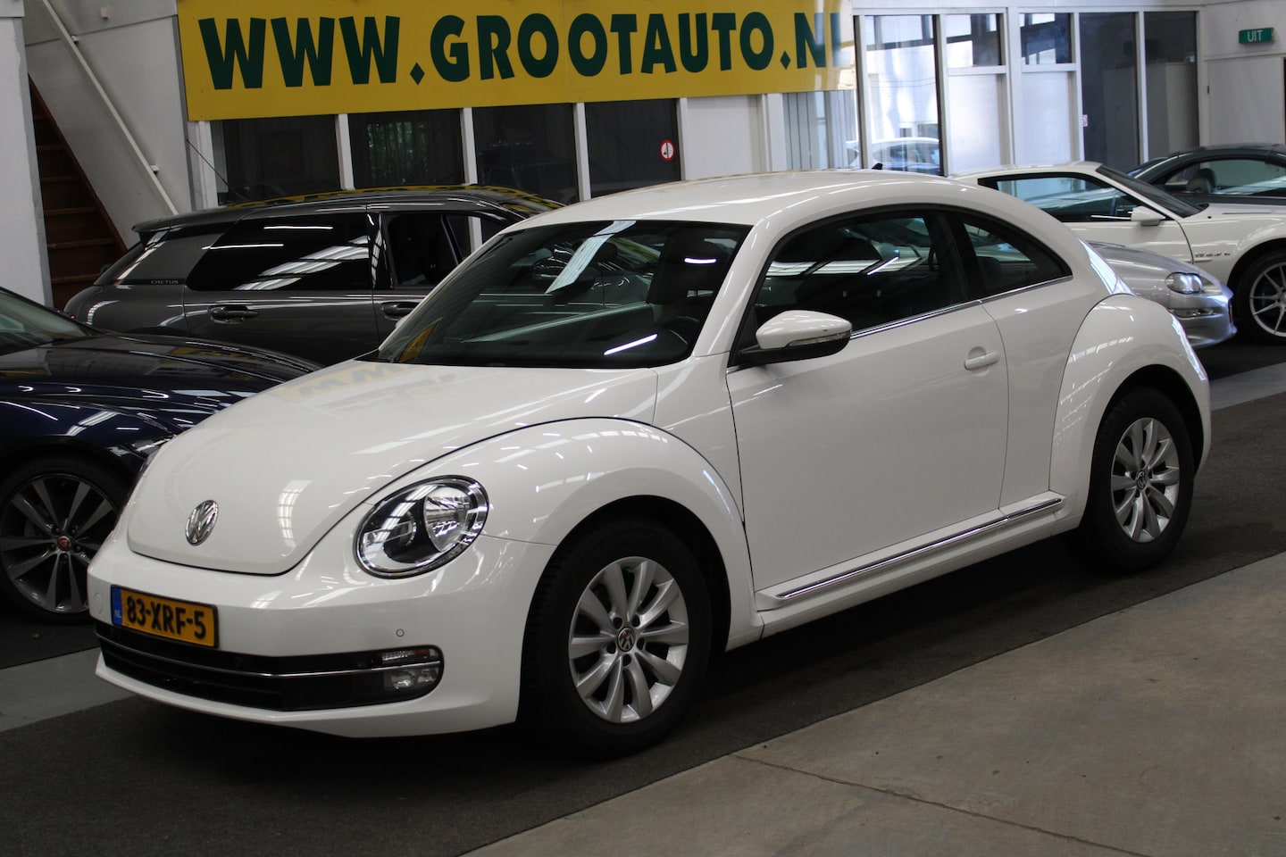 Volkswagen Beetle - 1.2 TSI Design Airco, Cruise control, Navi, Stoelverwarming - AutoWereld.nl